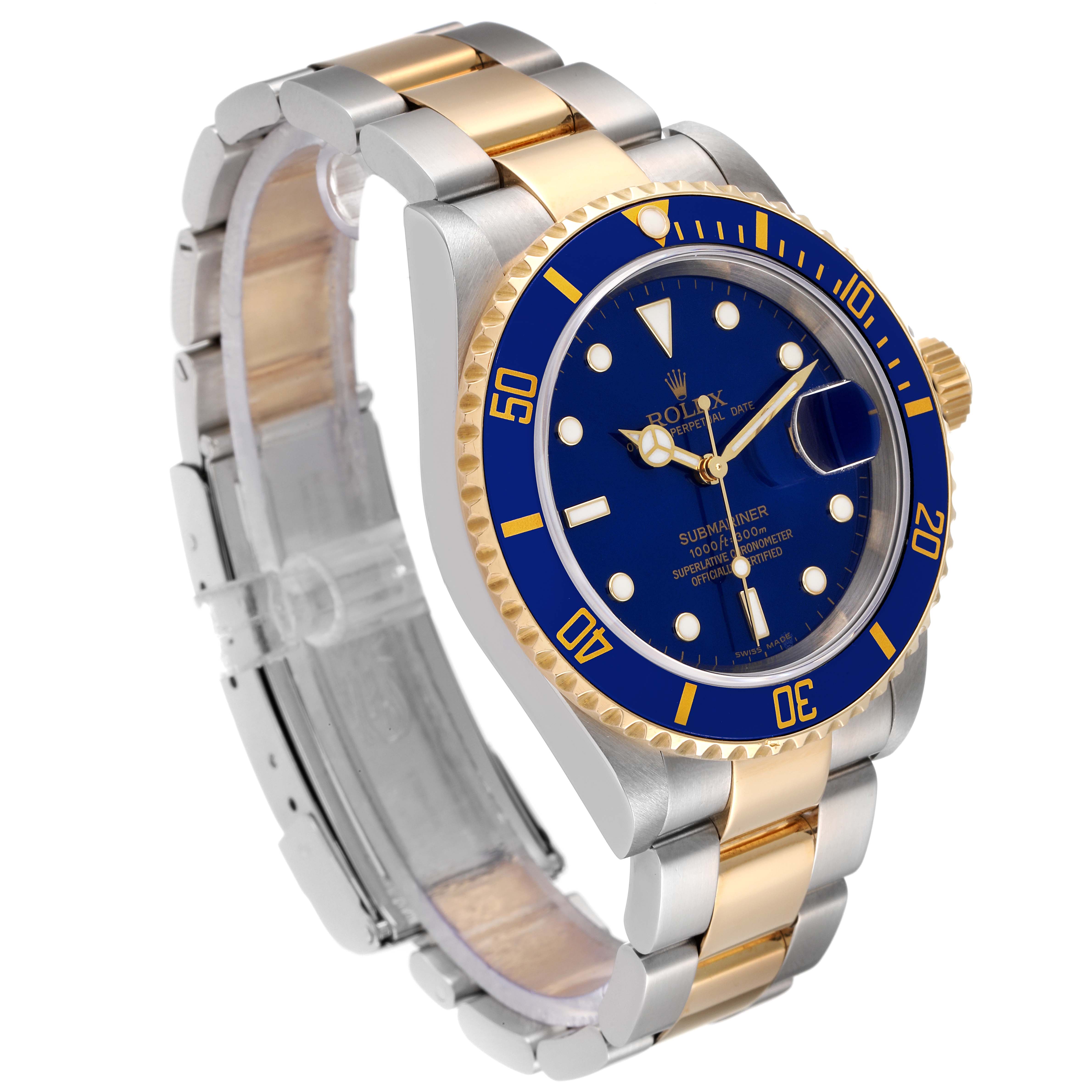The image shows a Rolex Submariner 16613 Men
s Steel and Gold (two tone) Blue Dial 16613 Men
s Steel and Gold (two tone) Blue Dial watch at an angled side view, highlighting the bezel, dial, crown, and bracelet.