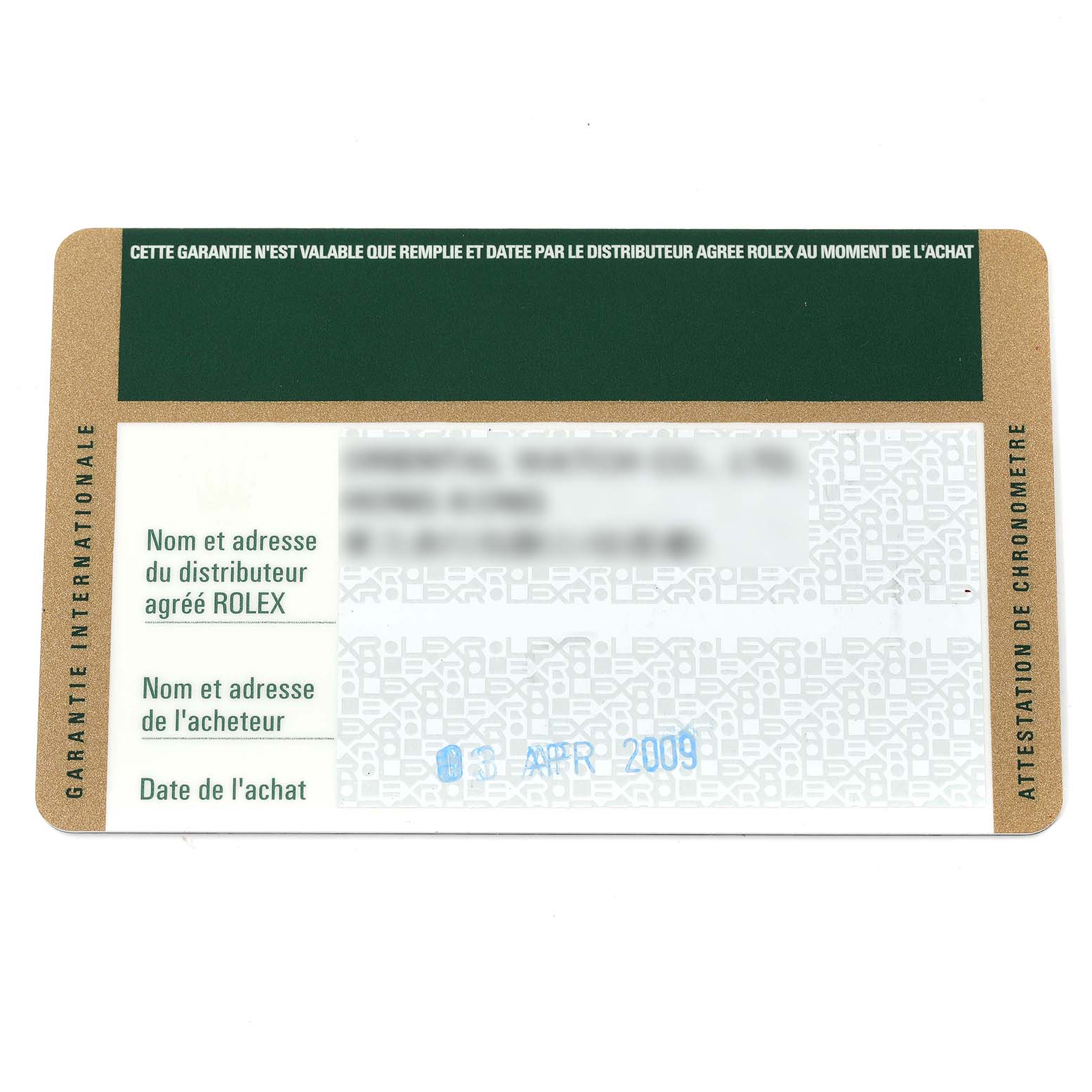 This image shows the guarantee card for a Rolex Submariner 14060M Men
s Stainless Steel Black Dial 14060M Men
s Stainless Steel Black Dial watch from an overhead angle.