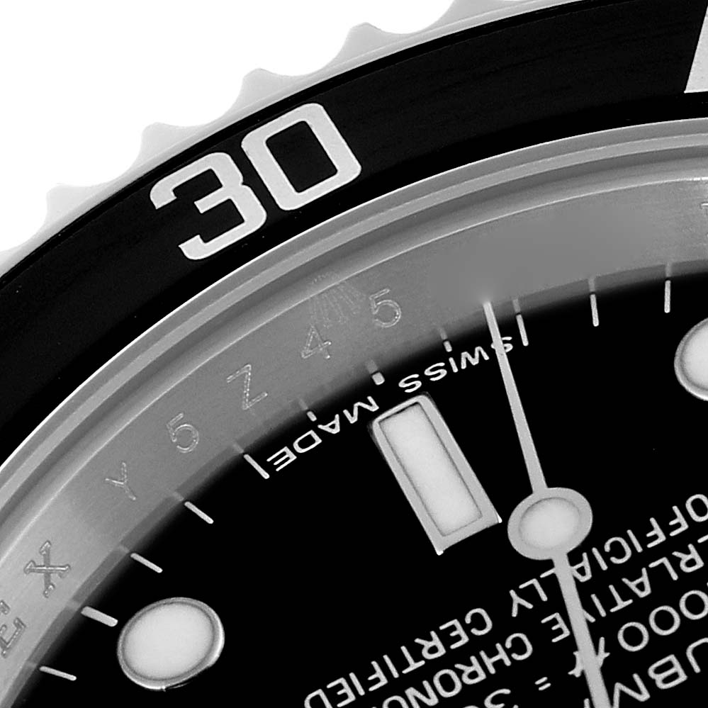 This close-up angle of the Rolex Submariner 14060 Men
s Stainless Steel Black Dial 14060 Men
s Stainless Steel Black Dial watch shows part of the bezel, dial, and minute markers.