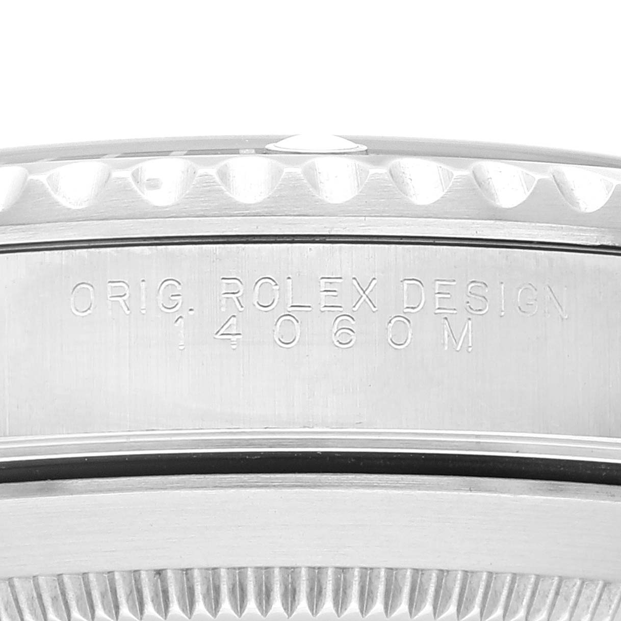 This is a close-up angle of the side of a Rolex Submariner 14060 Men
s Stainless Steel Black Dial 14060 Men
s Stainless Steel Black Dial, focusing on the engraved watch model number and design text.