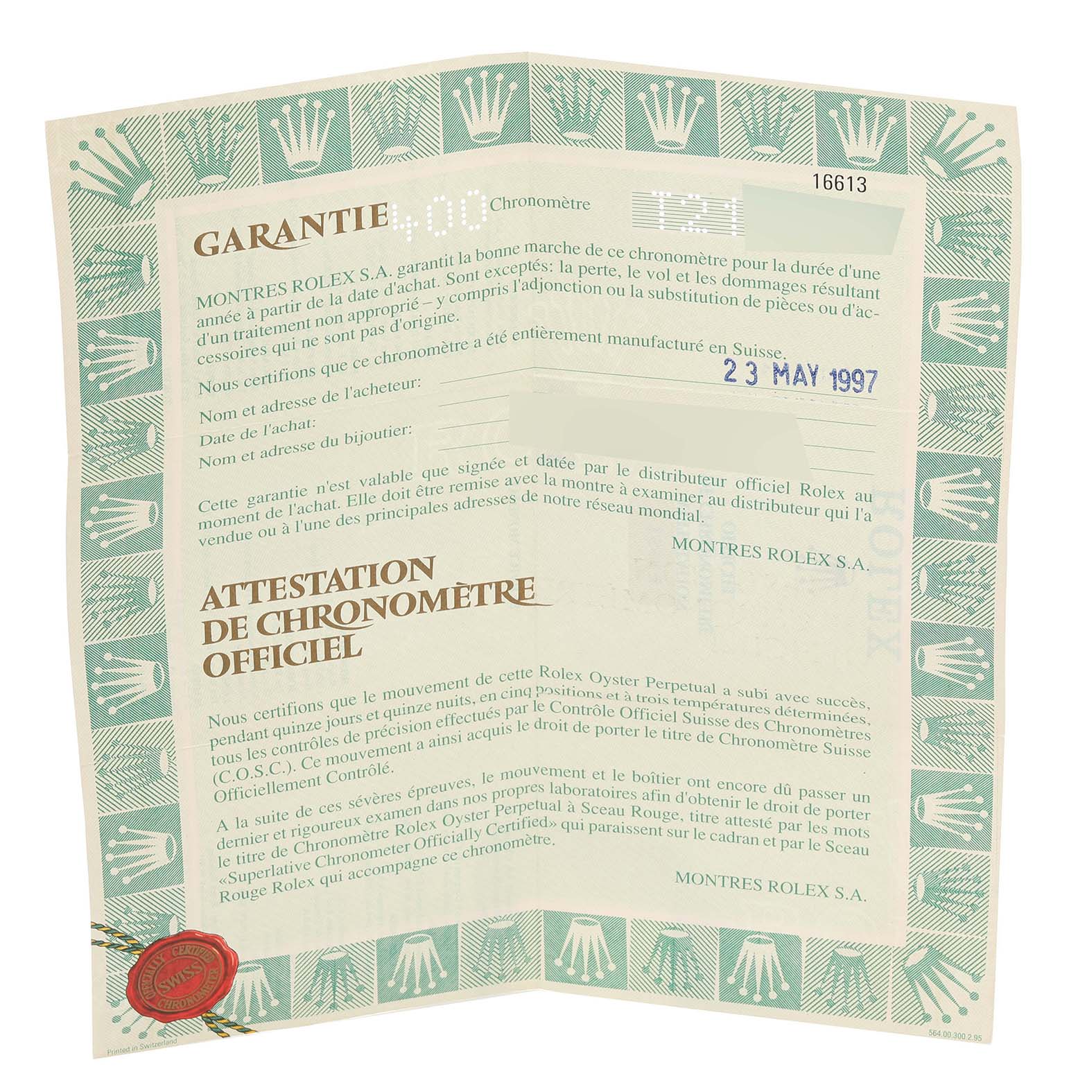 The image shows the warranty card and official chronometer certification for a Rolex Submariner 16613 Men
s Steel and Gold (two tone) Black Dial 16613 Men
s Steel and Gold (two tone) Black Dial model, dated May 23, 1997.