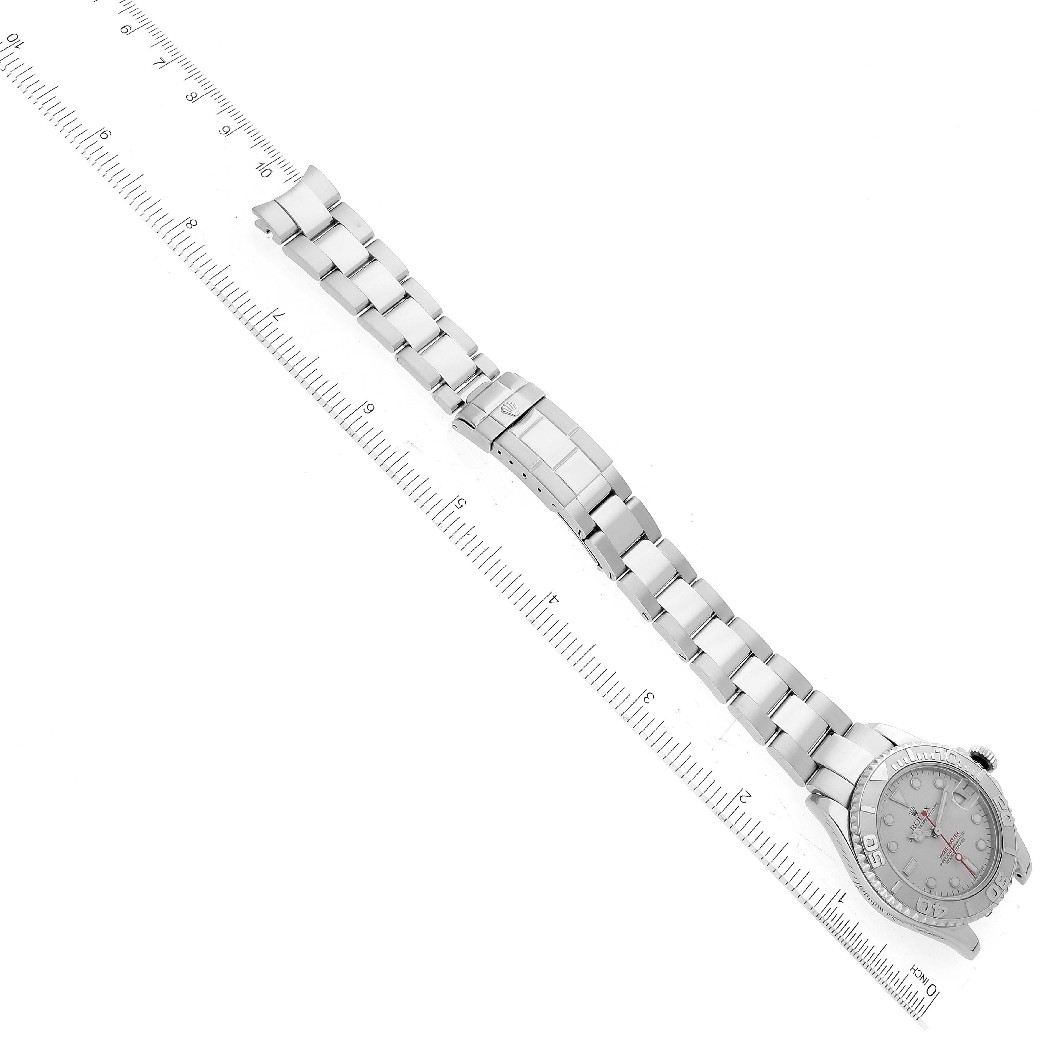 The image shows the Rolex Yacht-Master 168622 Men's Stainless Steel Silver Dial 168622 Men's Stainless Steel Silver Dial watch laid flat with a ruler beside it for scale.