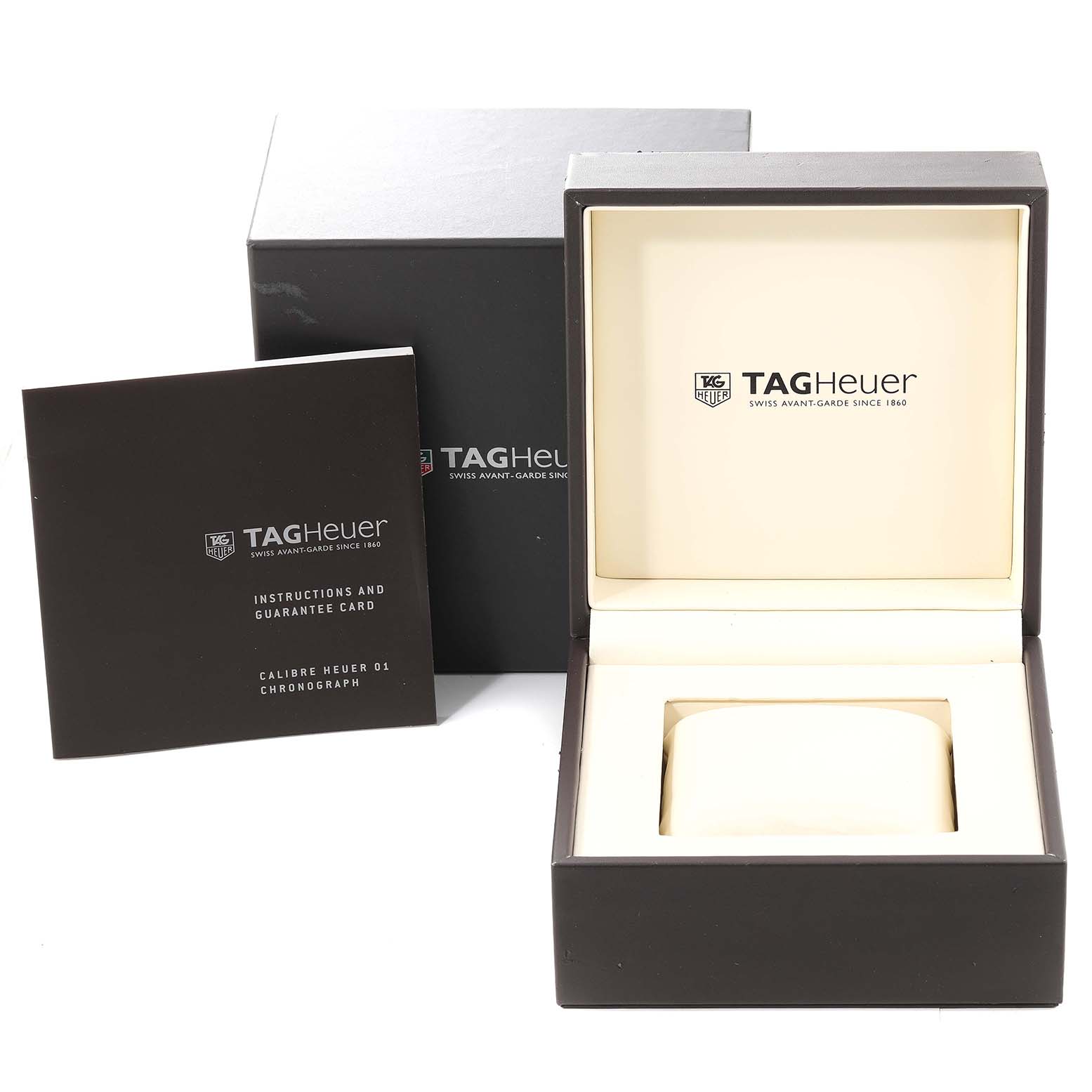 The image shows an open box, outer box, and instruction manual for a Tag Heuer Carrera CAR2A1Z Men's Stainless Steel Transparent Dial CAR2A1Z Men's Stainless Steel Transparent Dial watch.