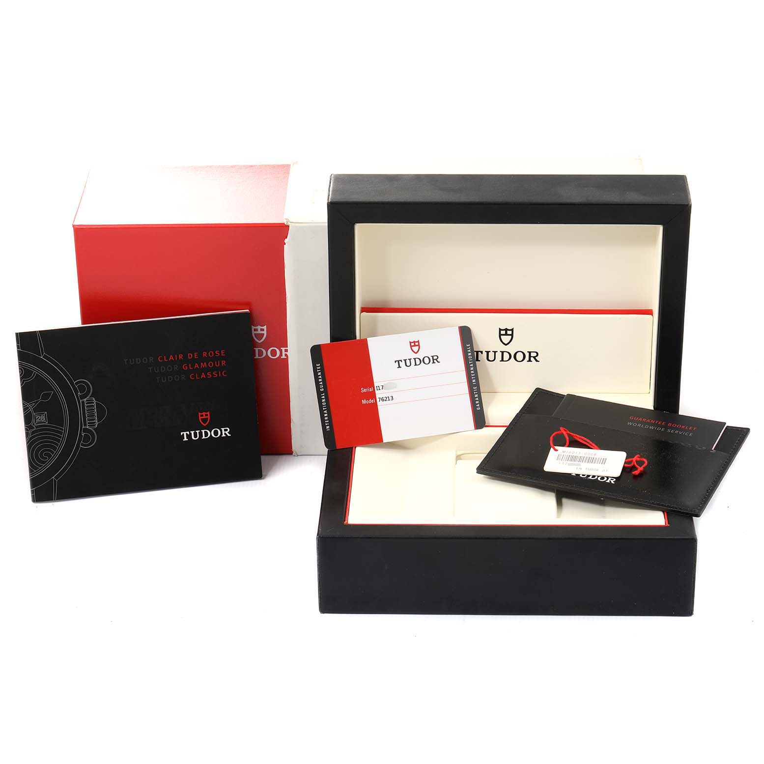 This image shows the packaging and accessories, including booklets and warranty cards, for the Tudor Prince 76213 Men's Steel and Gold (two tone) Silver Dial 76213 Men's Steel and Gold (two tone) Silver Dial model watch.