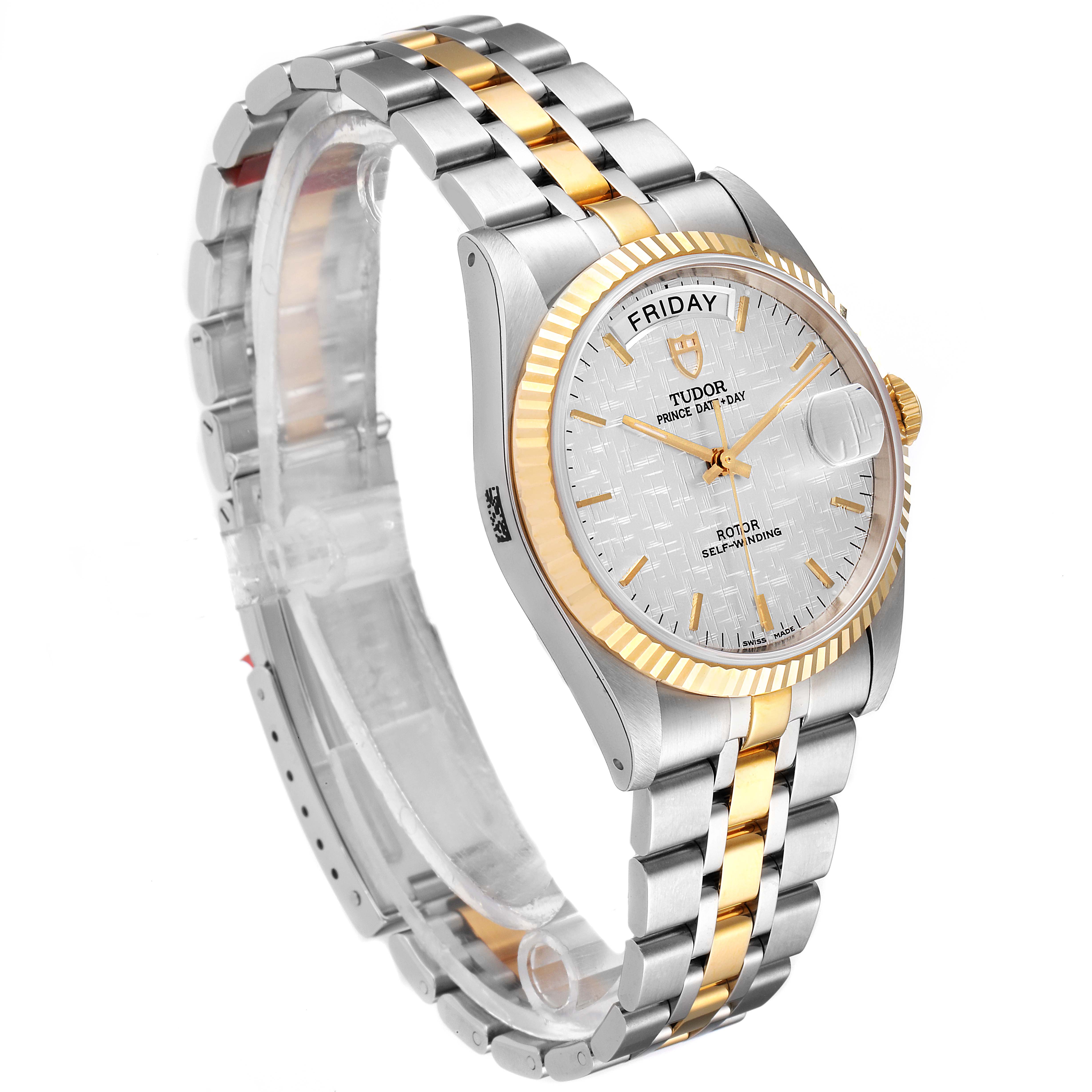 The Tudor Prince 76213 Men's Steel and Gold (two tone) Silver Dial 76213 Men's Steel and Gold (two tone) Silver Dial model watch showcases a side view highlighting its two-tone bracelet, fluted bezel, and dial with day and date displays.