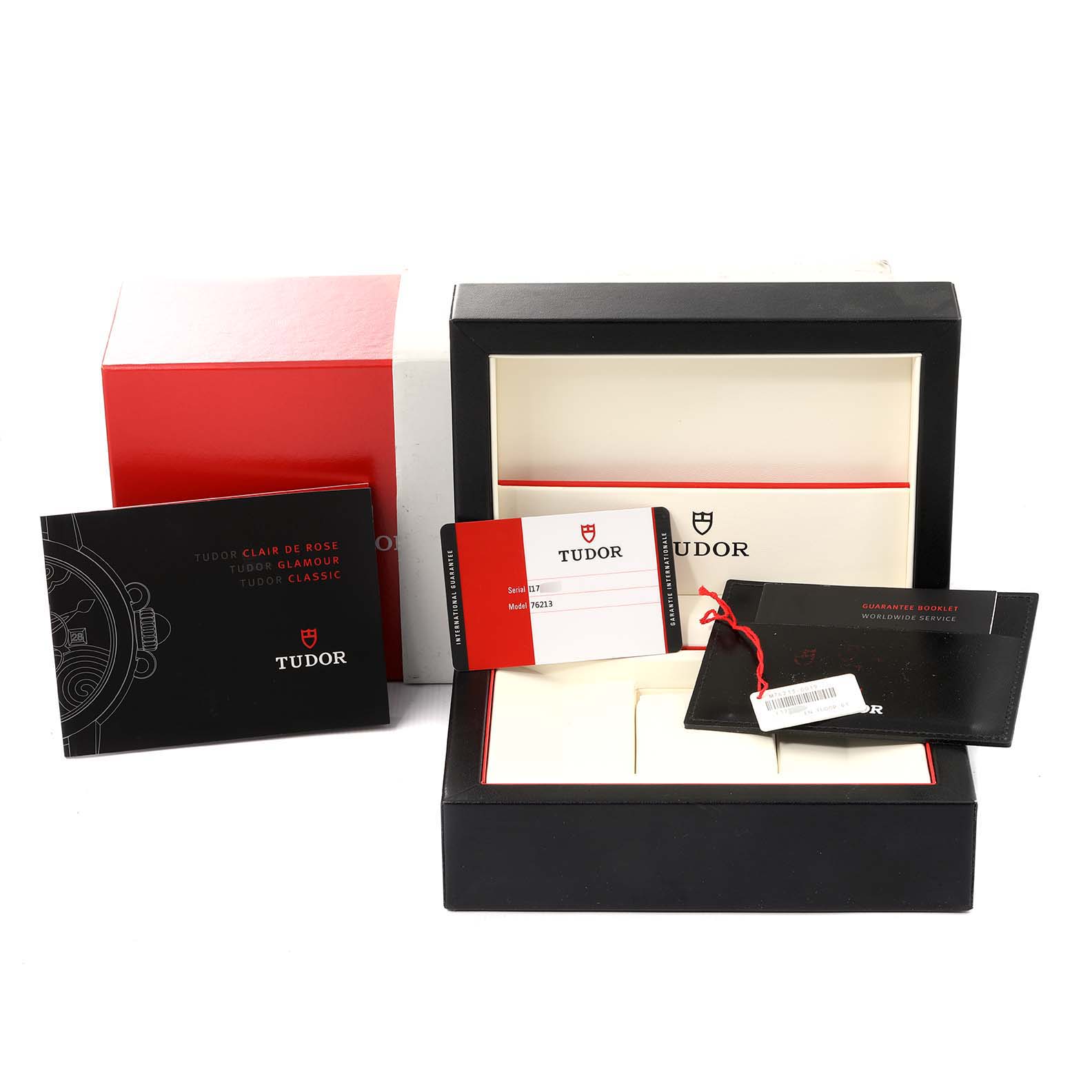The image shows the packaging and accessories for a Tudor Prince 76213 Men's Steel and Gold (two tone) Silver Dial 76213 Men's Steel and Gold (two tone) Silver Dial model watch, including the box, warranty card, and booklets.