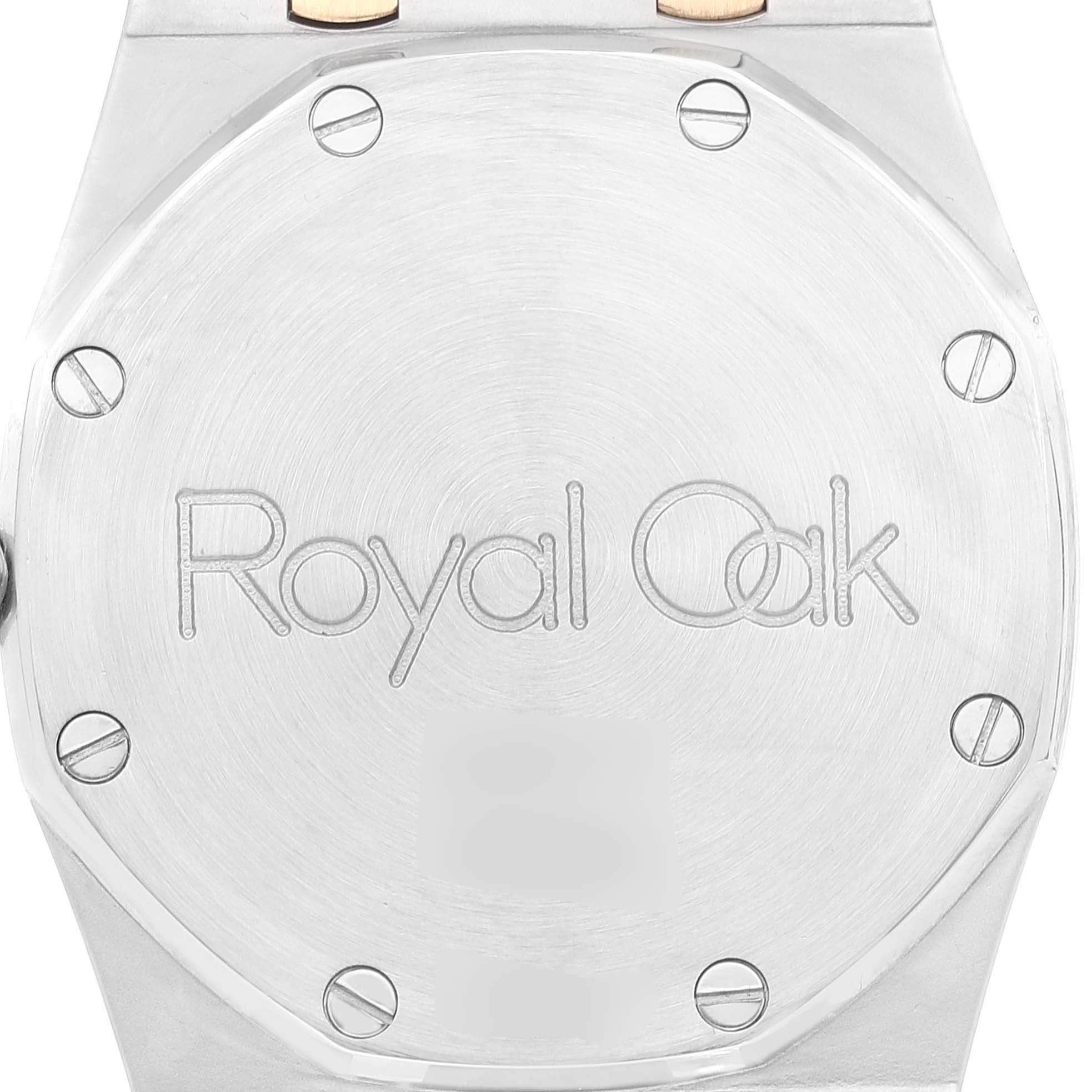 This image shows the case back of a Royal Oak watch by Audemars Piguet, featuring the engraved model name "Royal Oak."