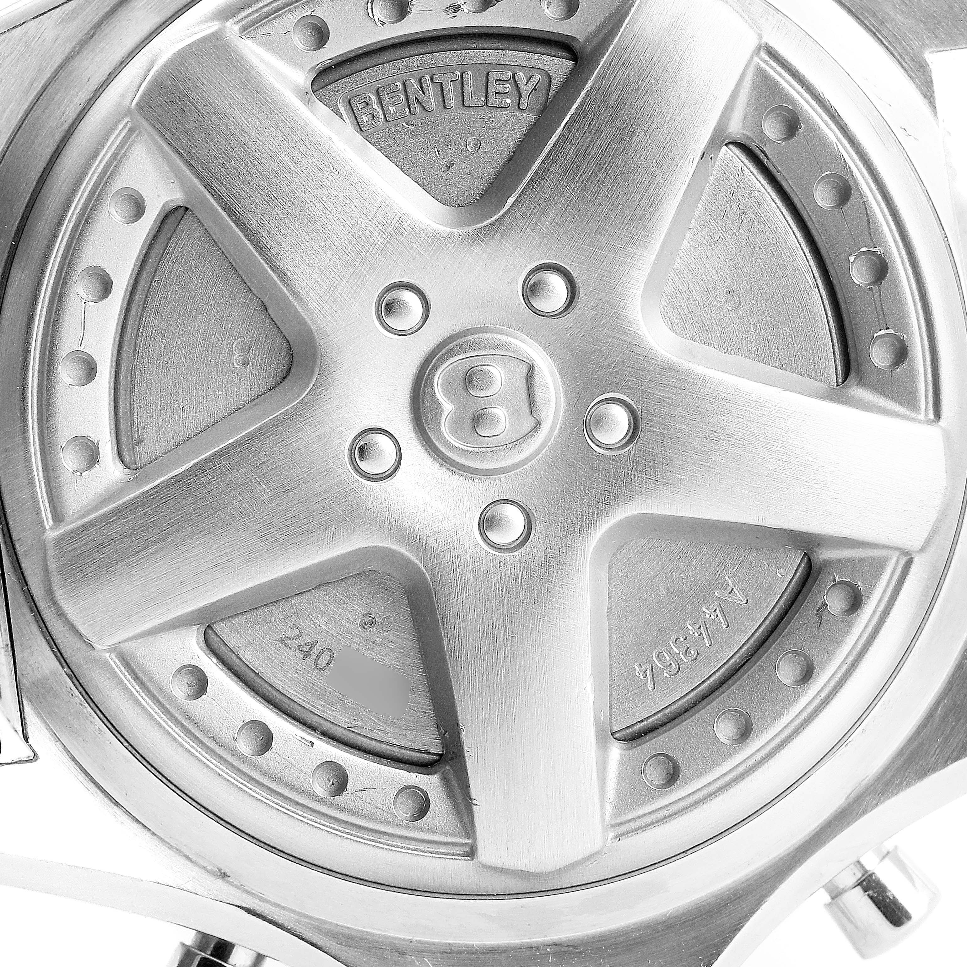 This image shows the back case of a Breitling Bentley A44364 Men's Stainless Steel Silver Dial A44364 Men's Stainless Steel Silver Dial model watch, featuring a car rim design with the Bentley logo.