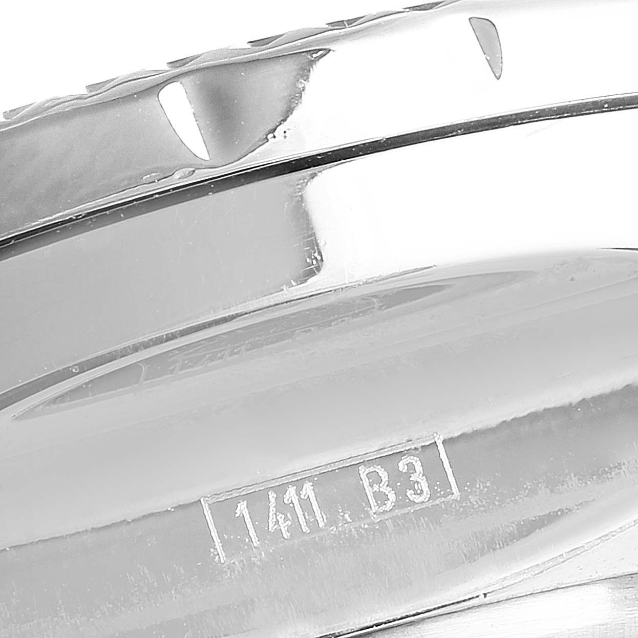 This image shows a close-up of the side of the case and bezel of a Bentley model by Breitling.