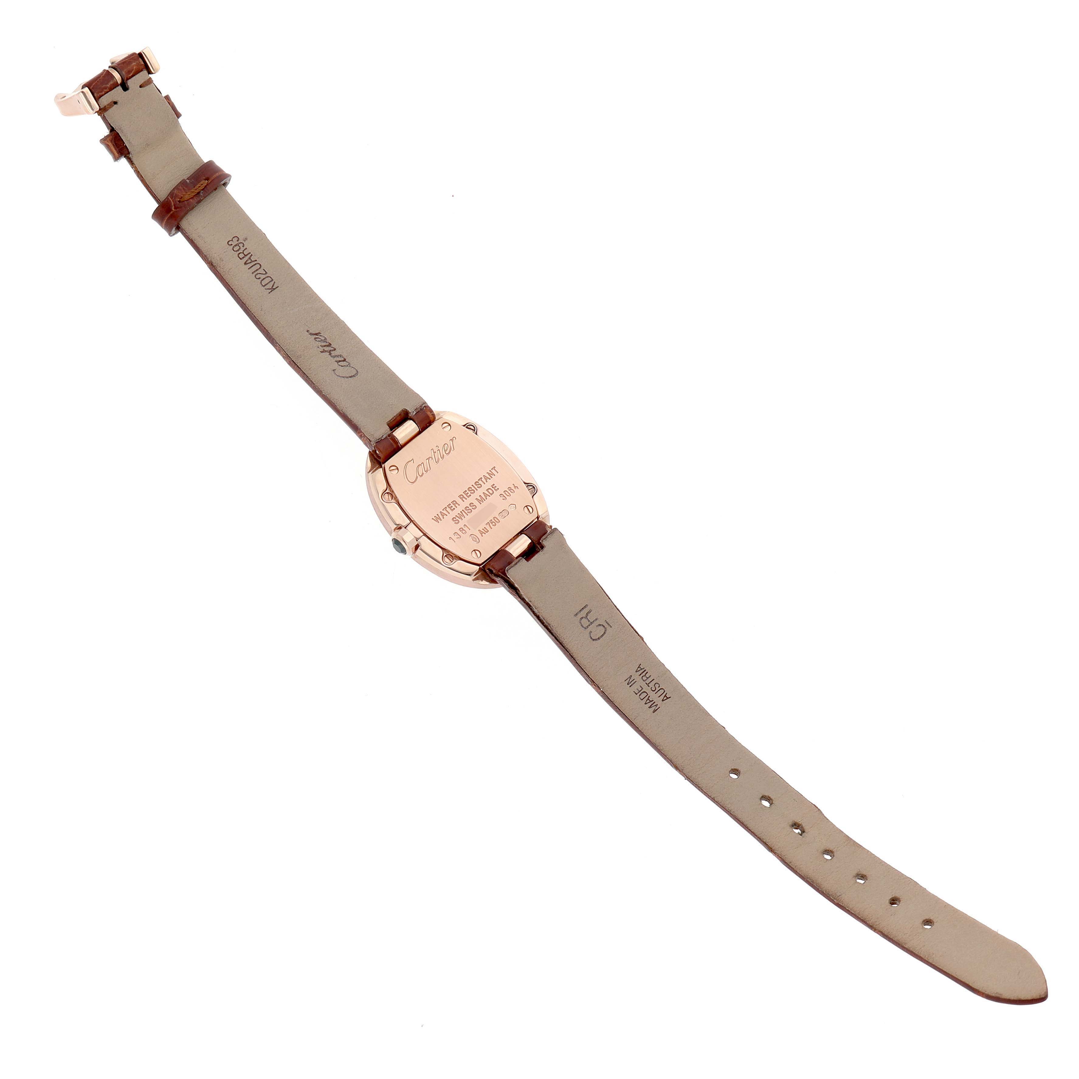 The Cartier Baignoire W8000007 Women's Rose Gold Silver Dial watch is shown from the back, displaying its case back and leather strap with buckle closure.