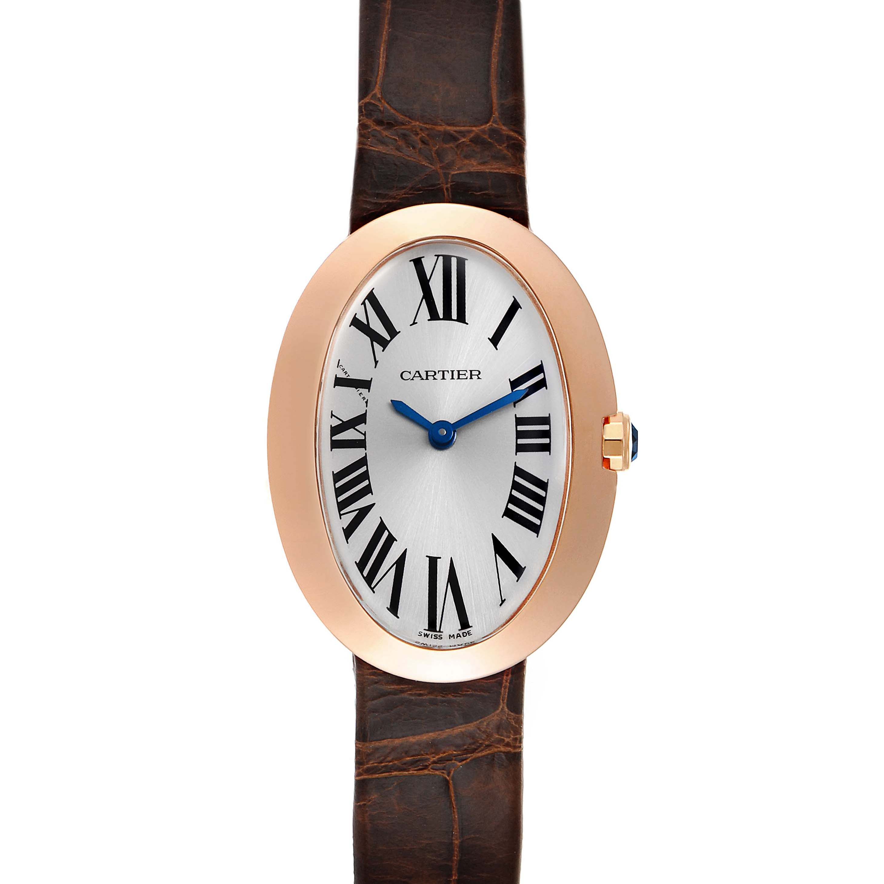 The image shows a frontal view of a Cartier Baignoire W8000007 Women's Rose Gold Silver Dial W8000007 Women's Rose Gold Silver Dial watch featuring an oval face, Roman numerals, and a brown leather strap.