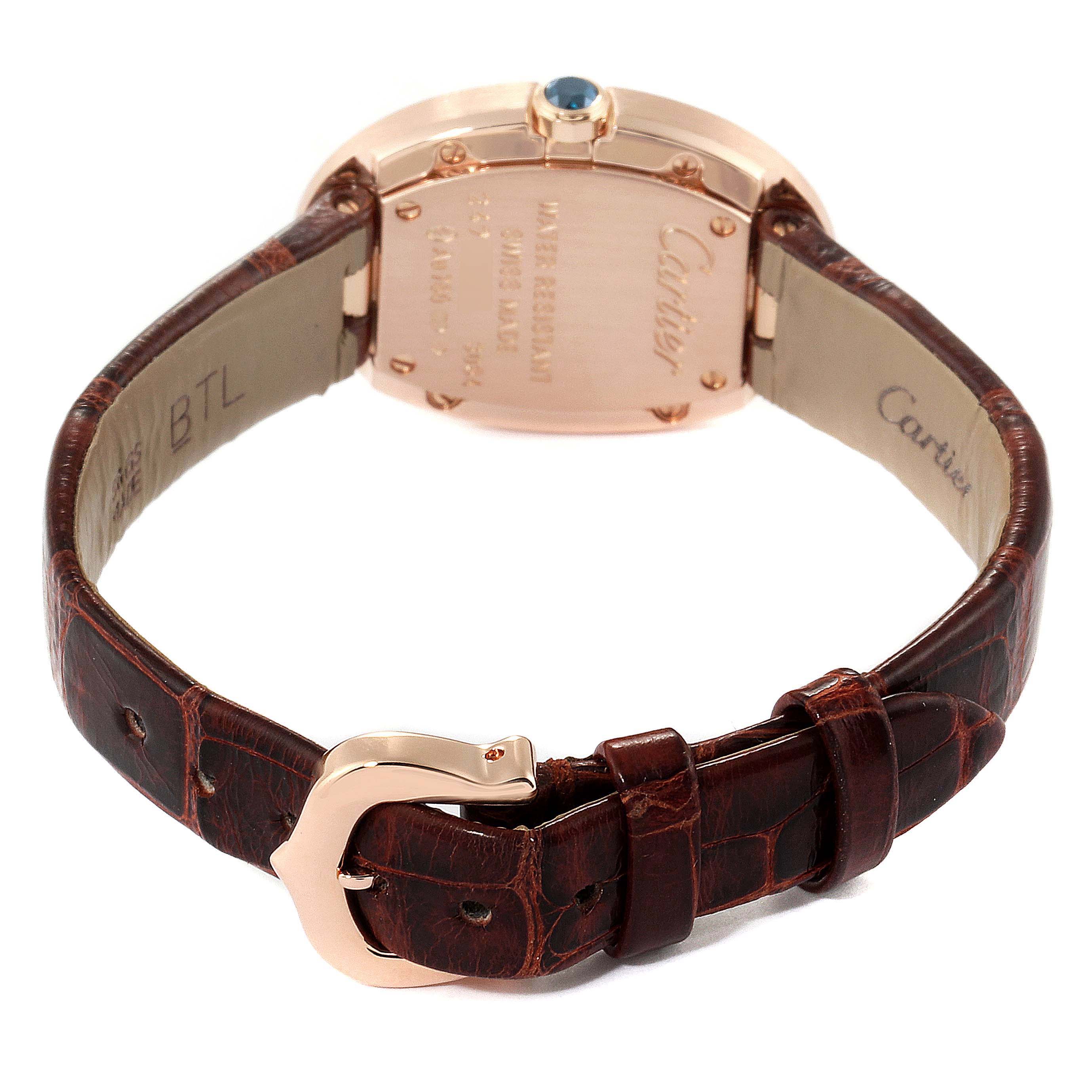 The image shows the back view of a Cartier Baignoire W8000007 Women's Rose Gold Silver Dial W8000007 Women's Rose Gold Silver Dial watch, including its case back, crown, and leather strap with a buckle.