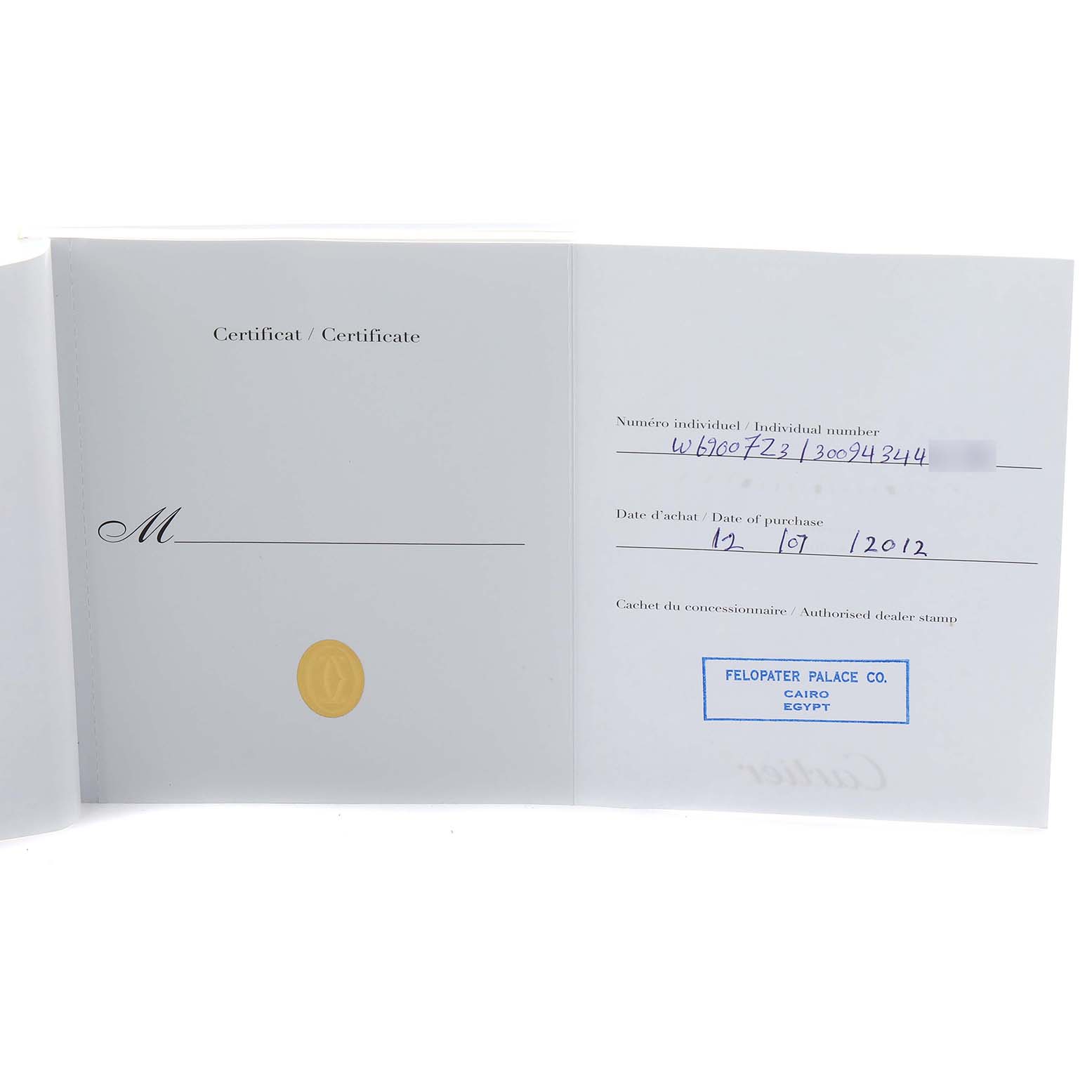 The image shows a certificate for the Cartier Ballon Bleu W69007Z3 Women's Stainless Steel Silver Dial watch, detailing purchase information and a dealer stamp.