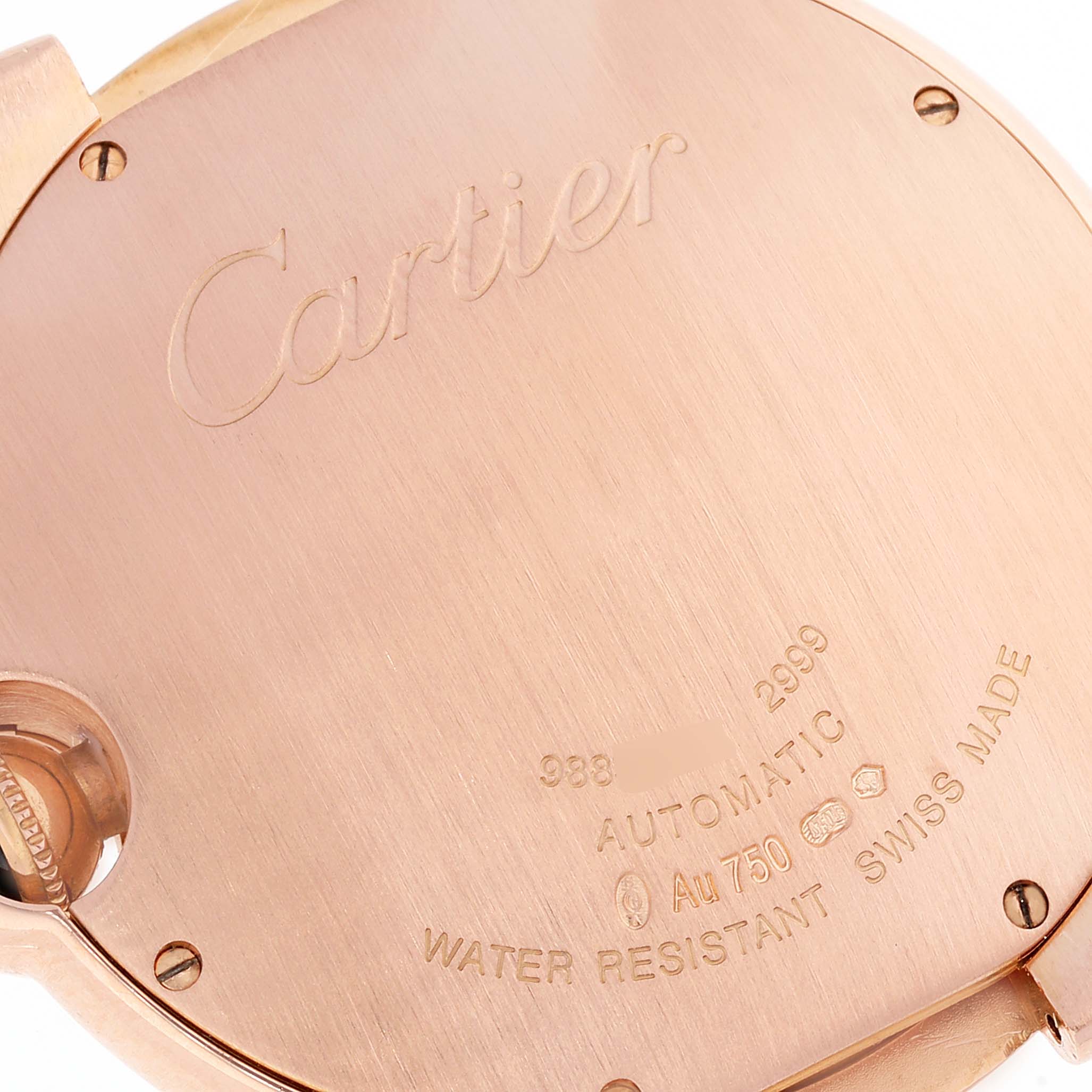 The image shows the back case of a Cartier Ballon Bleu W6920037 Men's Rose Gold Brown Dial W6920037 Men's Rose Gold Brown Dial watch, displaying the brand name, and various engravings including water resistance and gold purity indications.