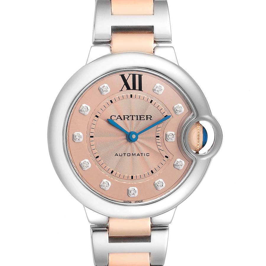 The Cartier Ballon Bleu WE902053 Women's Steel and Gold (two tone) Pink Dial watch is shown from the front, highlighting the dial, case, and part of the bracelet.