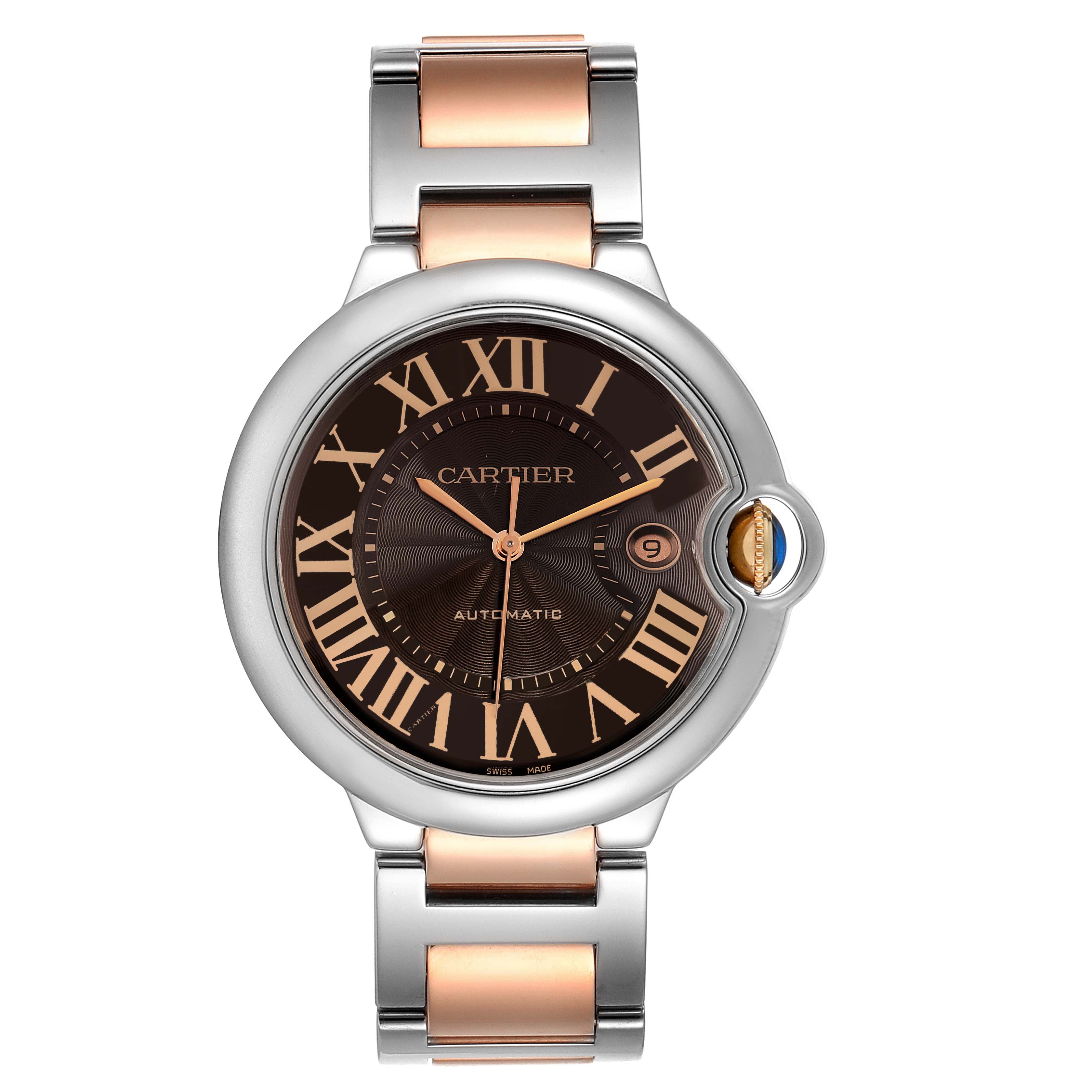 The image shows a frontal view of a Cartier Ballon Bleu W6920032 Men
s Steel and Gold (two tone) Brown Dial W6920032 Men
s Steel and Gold (two tone) Brown Dial watch with a two-tone metal bracelet and black dial with Roman numerals.