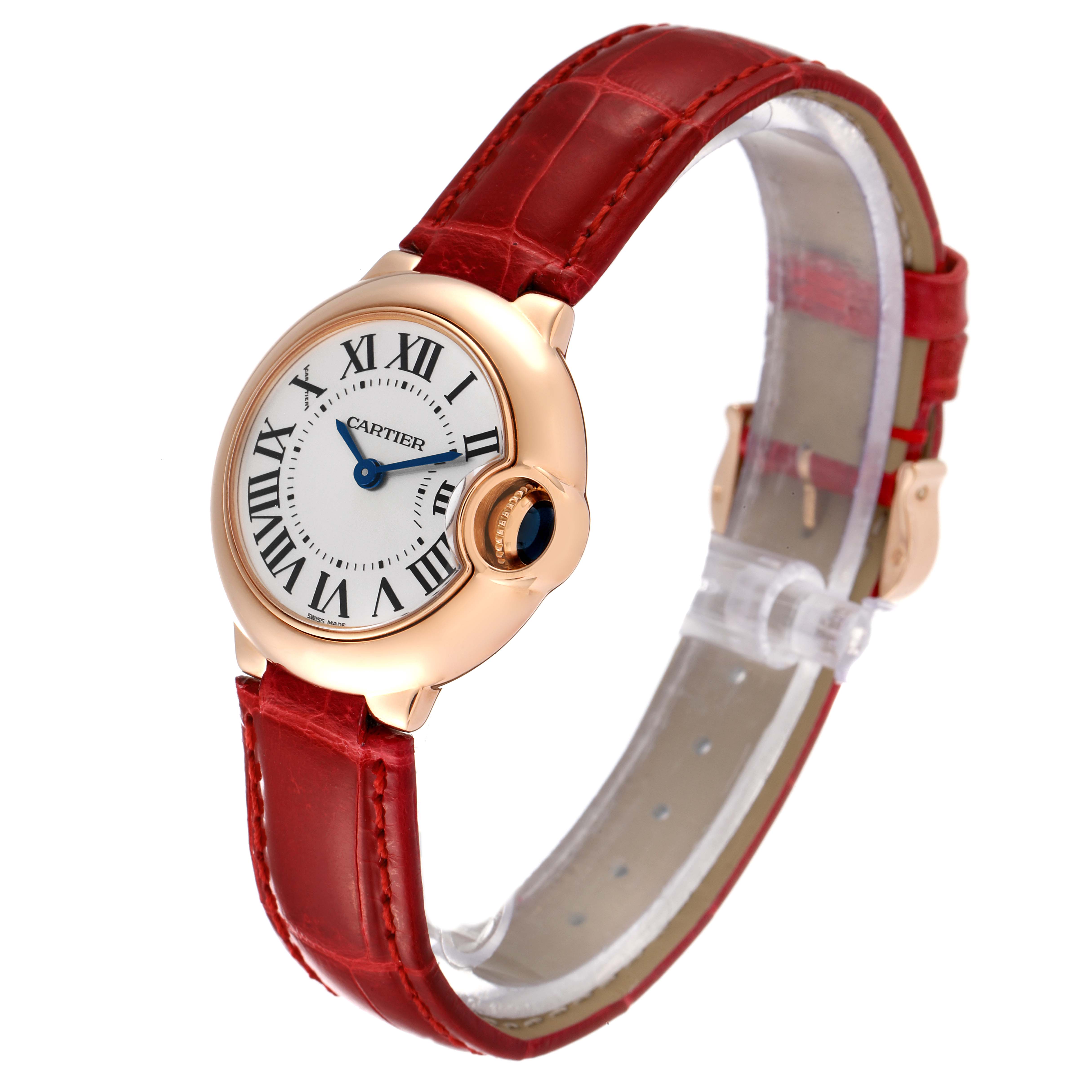 The image shows a Cartier Ballon Bleu W6900256 Women
s Rose Gold Silver Dial W6900256 Women
s Rose Gold Silver Dial watch angled slightly from the front, displaying its face, crown, and red leather strap.