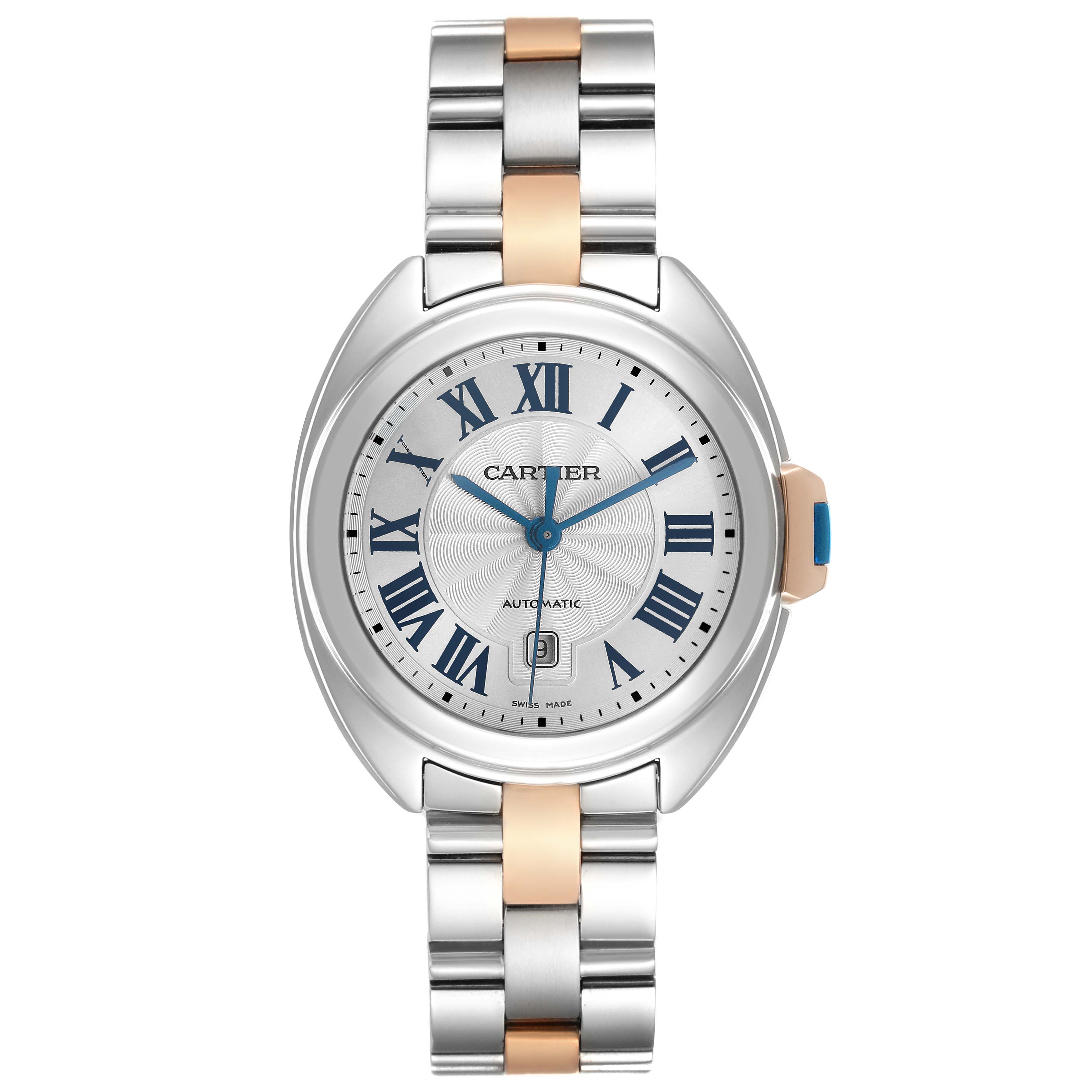 The Cartier Clé watch is shown from a top-down angle, featuring its face, bracelet, and crown.