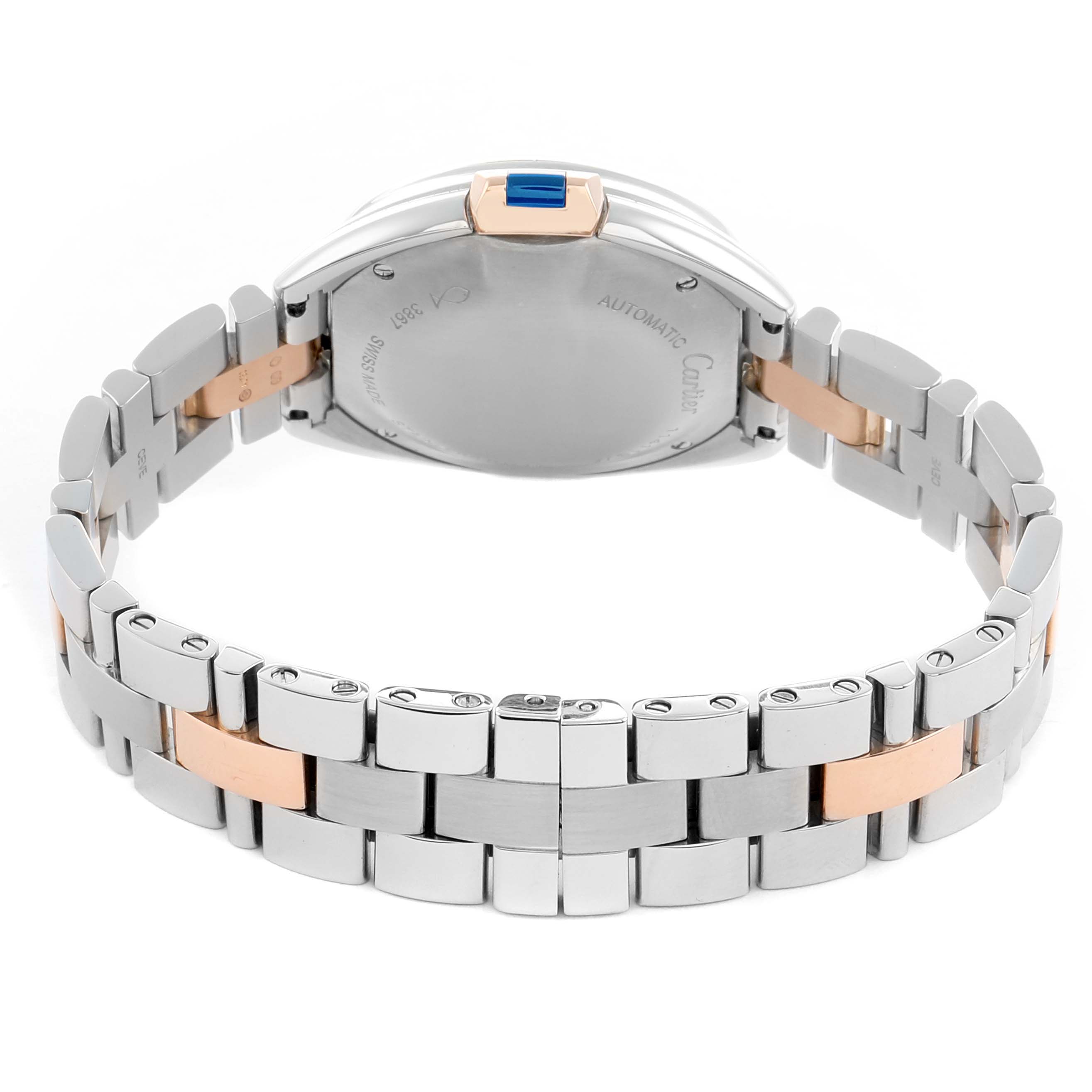 The image shows the back of a Cartier Clé watch, highlighting its bracelet and clasp.