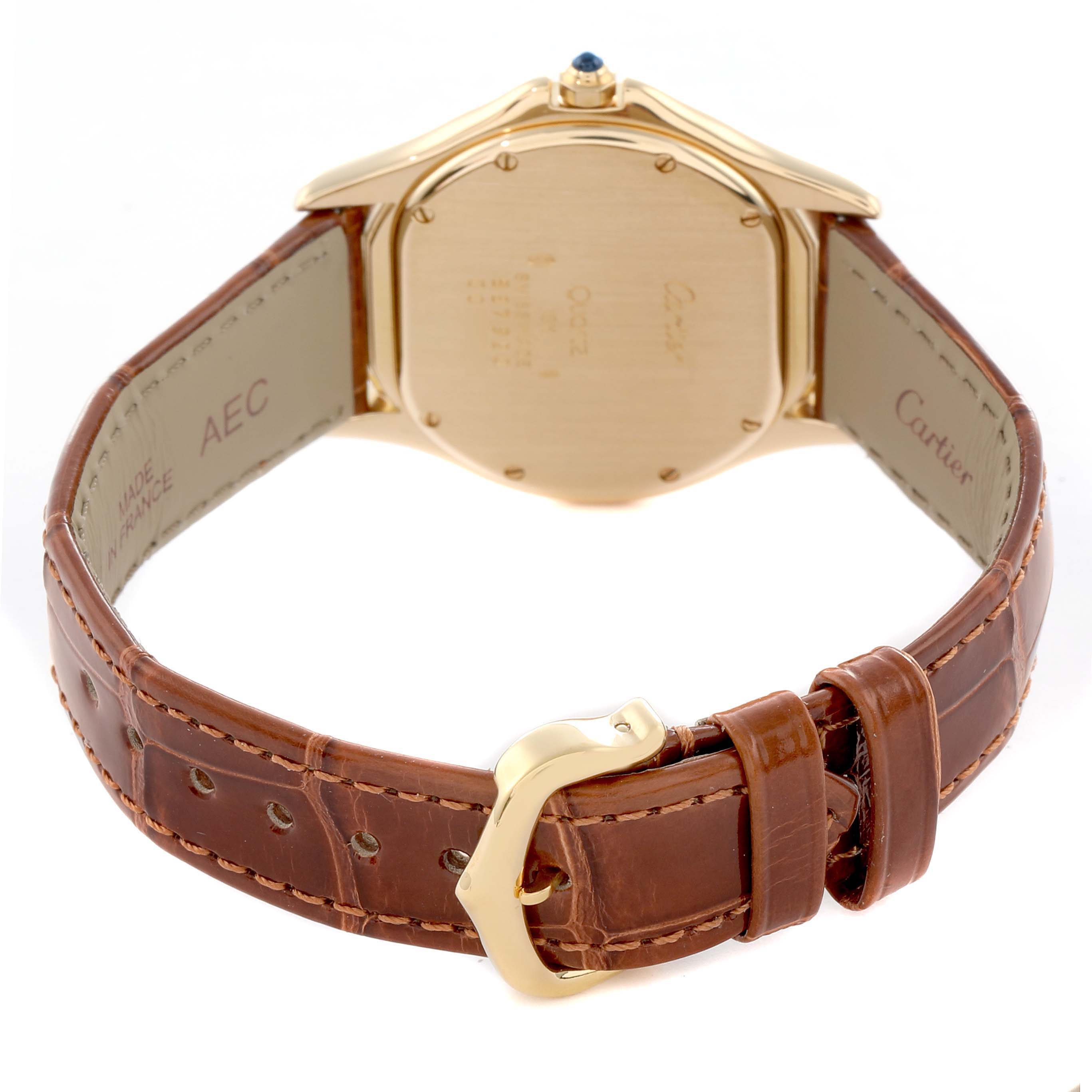 The image shows the back and clasp of a Cartier Panthère watch, highlighting the leather strap and gold case.
