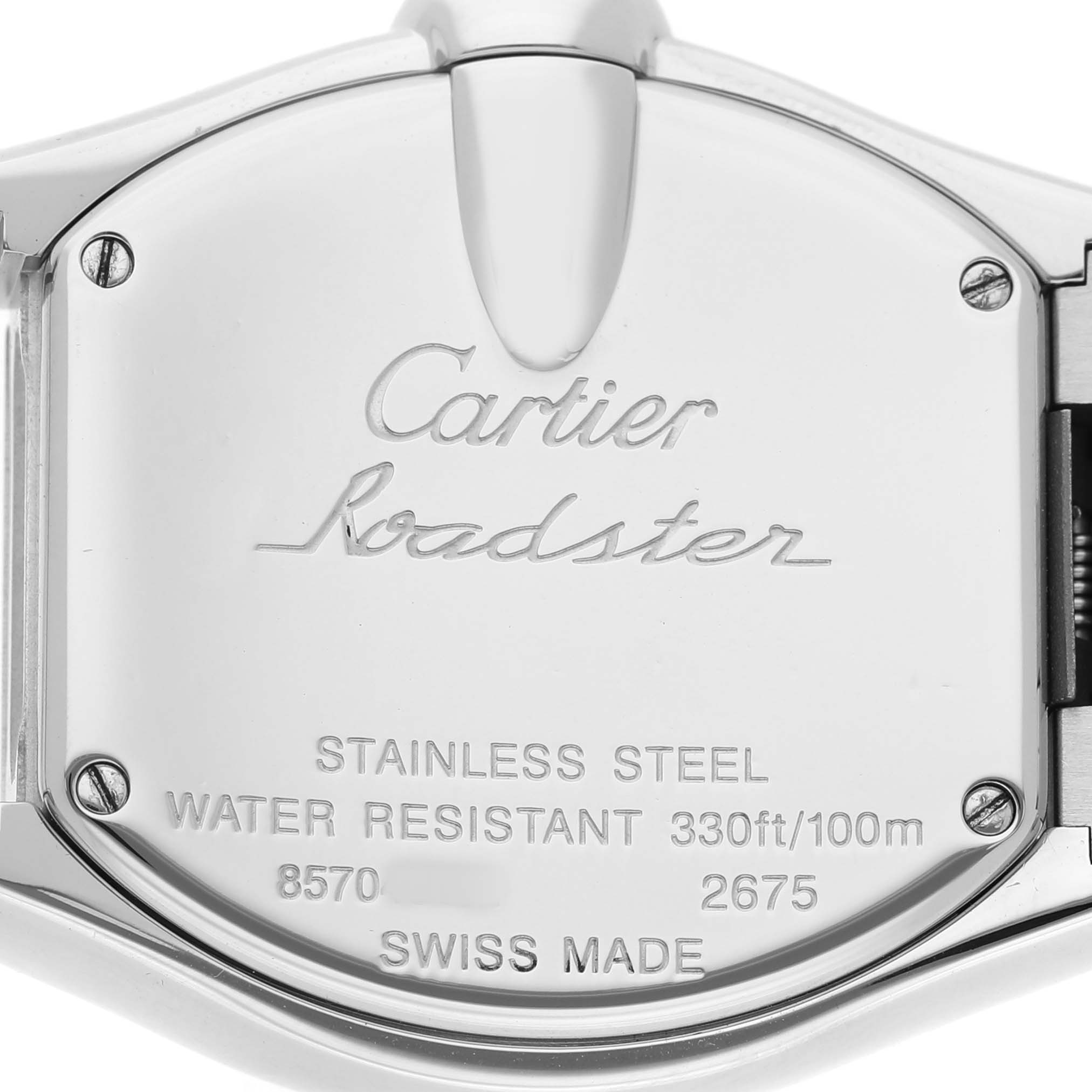 The image shows the case back of a Cartier Roadster W62016V3 Women's Stainless Steel Silver Dial watch, showcasing engraved details and screws.