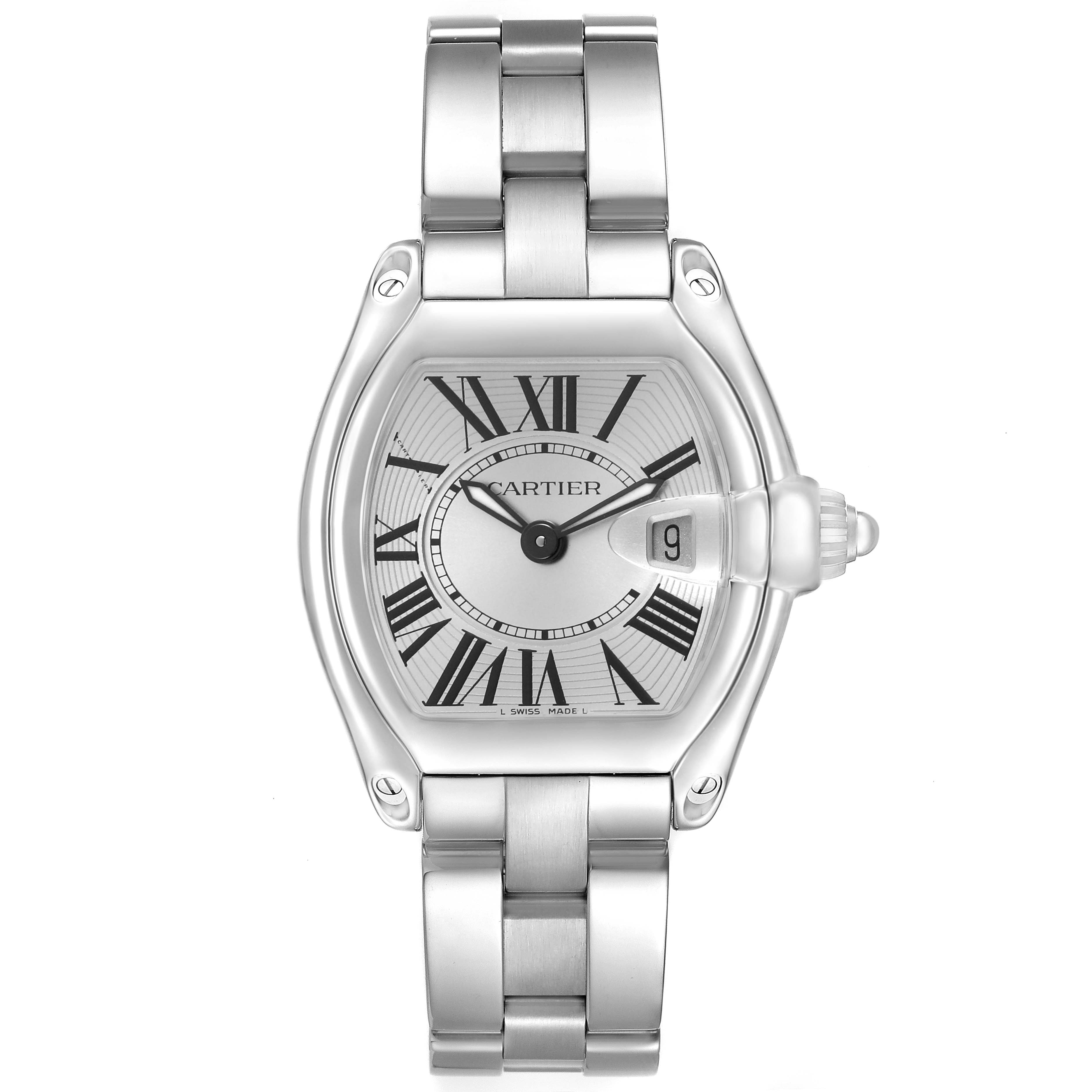 The Cartier Roadster W62016V3 Women's Stainless Steel Silver Dial watch is shown from a top-down angle highlighting its face, Roman numerals, date display, and metal bracelet.