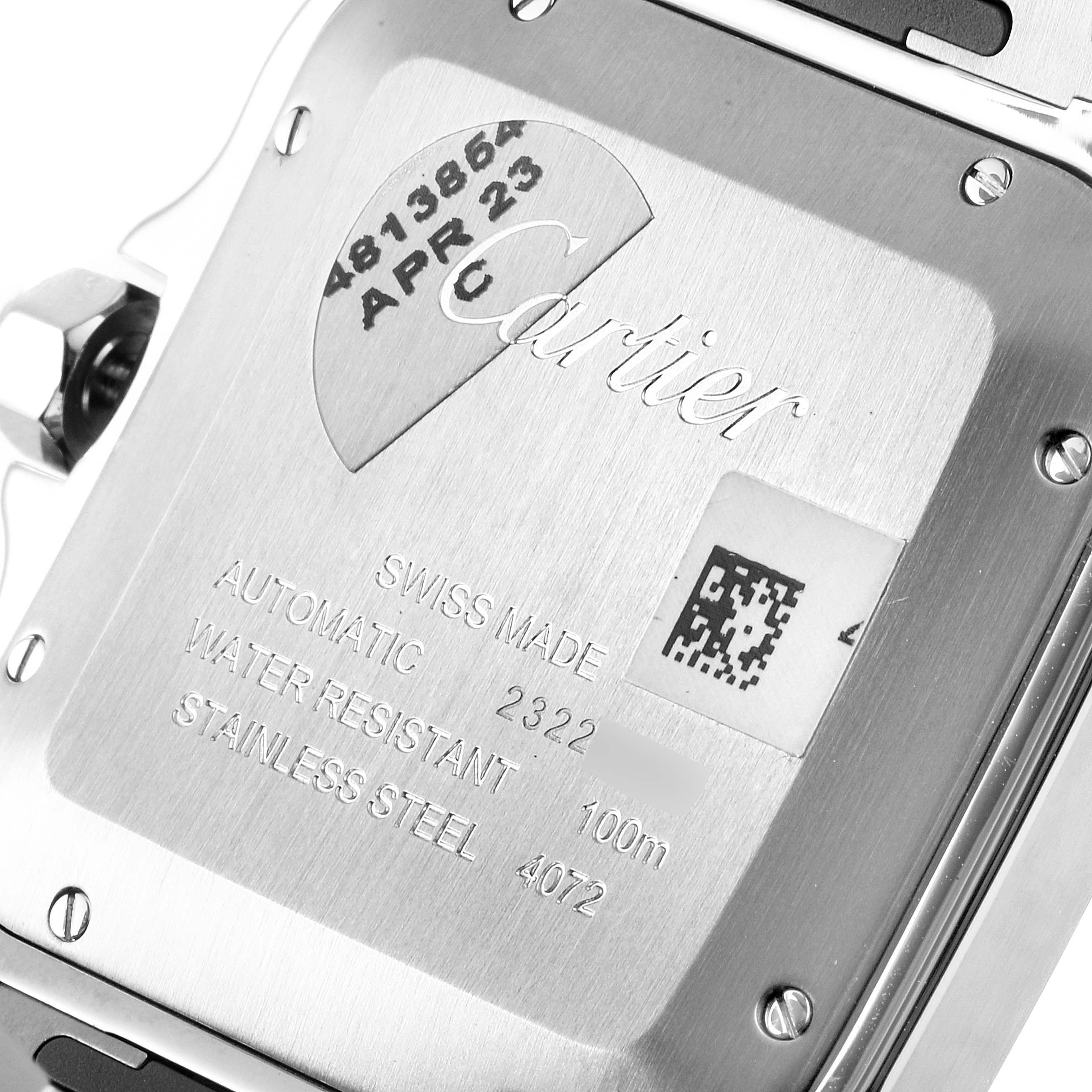 This image shows the case back of a Cartier Santos WSSA0030 Men's Stainless Steel Blue Dial WSSA0030 Men's Stainless Steel Blue Dial model watch, displaying markings and engravings.