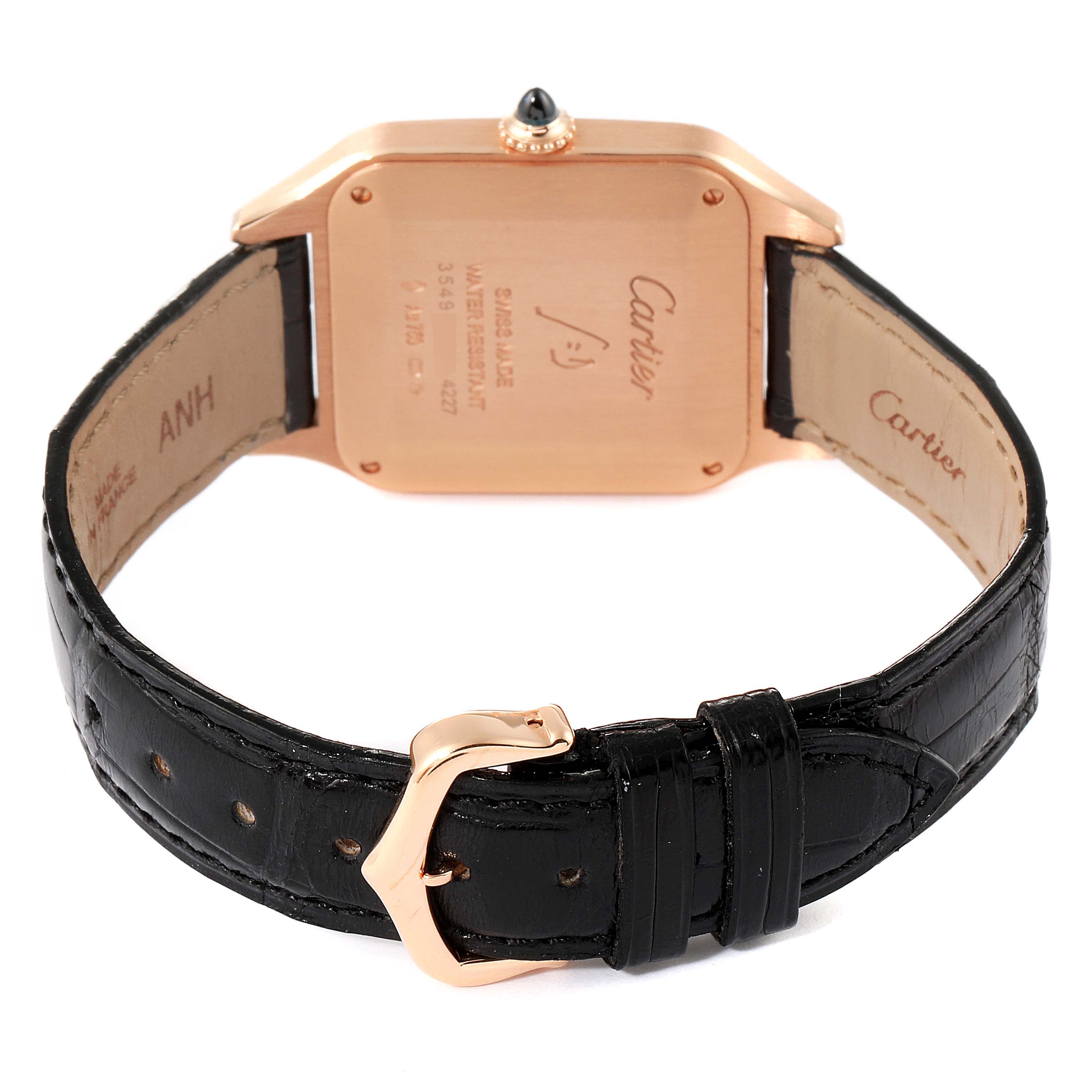 The image shows the back case and strap of a Cartier Santos Dumont WGSA0021 Men
s Rose Gold Silver Dial WGSA0021 Men
s Rose Gold Silver Dial watch from a rear angle.