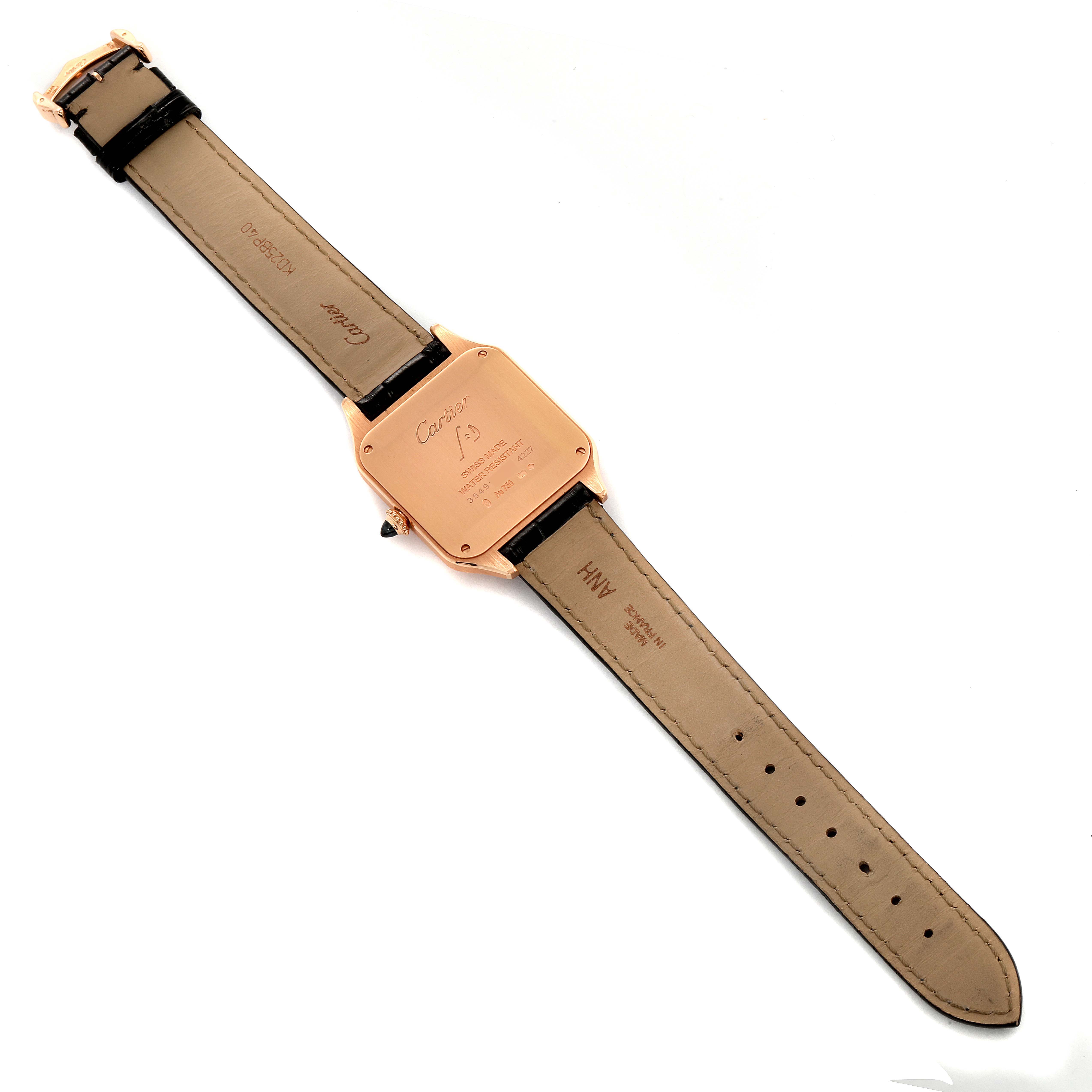 The Cartier Santos Dumont WGSA0021 Men
s Rose Gold Silver Dial WGSA0021 Men
s Rose Gold Silver Dial watch is shown from the back, displaying the strap, case back, and clasp.