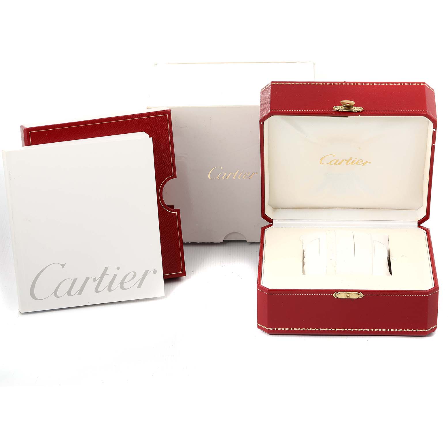 The image shows the packaging for the Santos Dumont model by Cartier, including a red box, white outer box, and booklet.