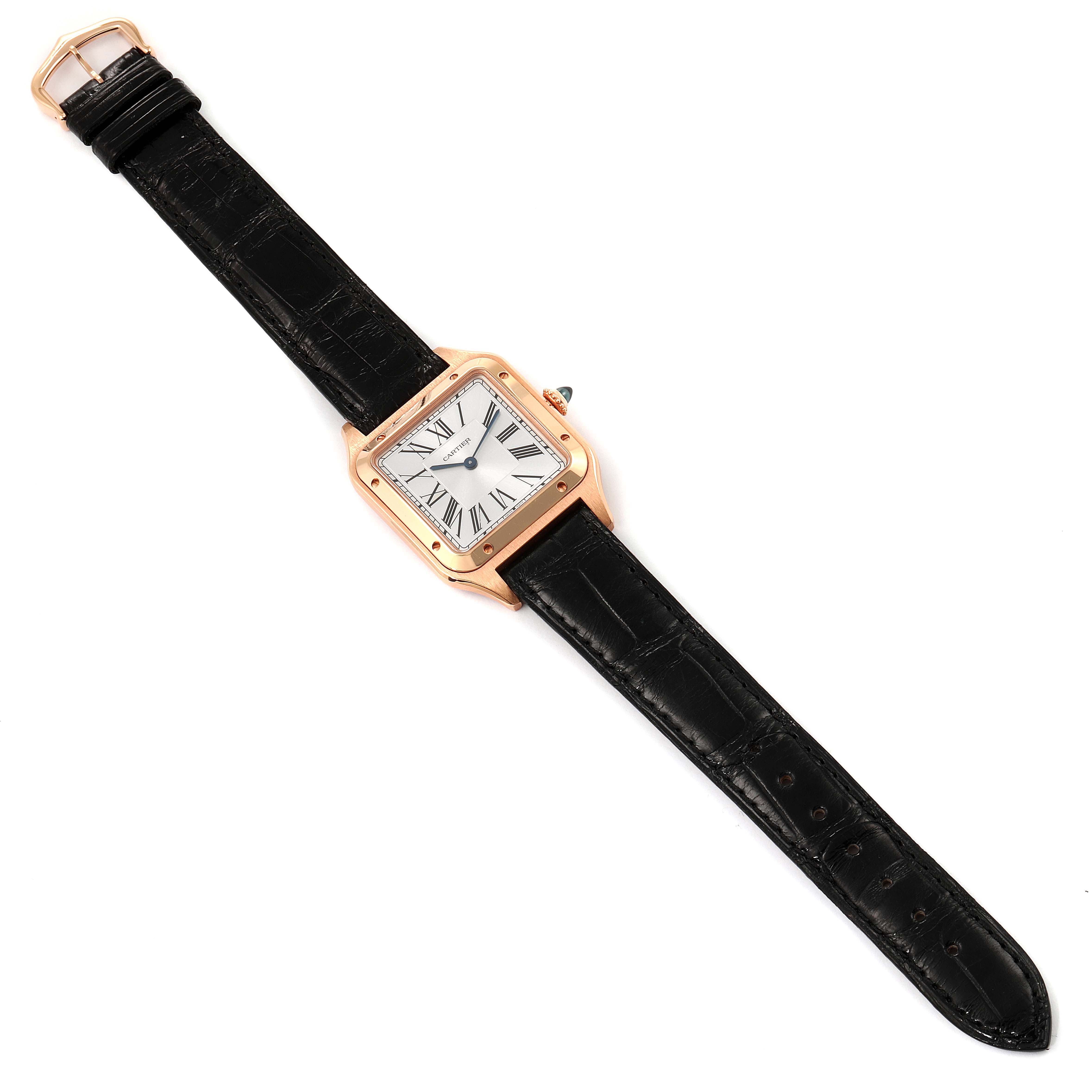 The image shows a full view of the Cartier Santos Dumont WGSA0021 Men
s Rose Gold Silver Dial WGSA0021 Men
s Rose Gold Silver Dial watch with a black leather strap and a rose gold case.