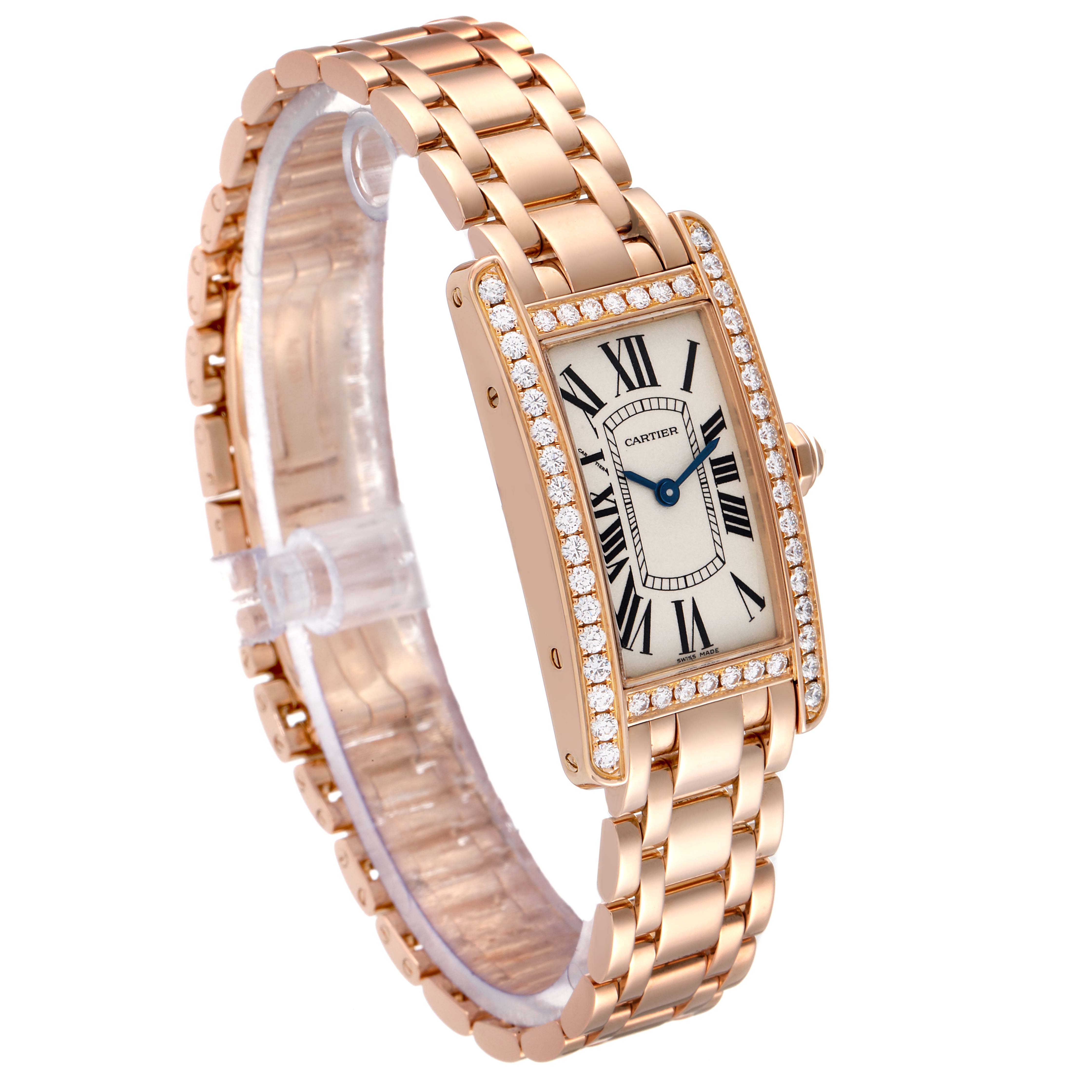 The Cartier Tank Americaine WB7079M5 Women's Rose Gold Silver Dial WB7079M5 Women's Rose Gold Silver Dial watch is shown at an angled side view, displaying its rectangular face, Roman numerals, and linked bracelet.