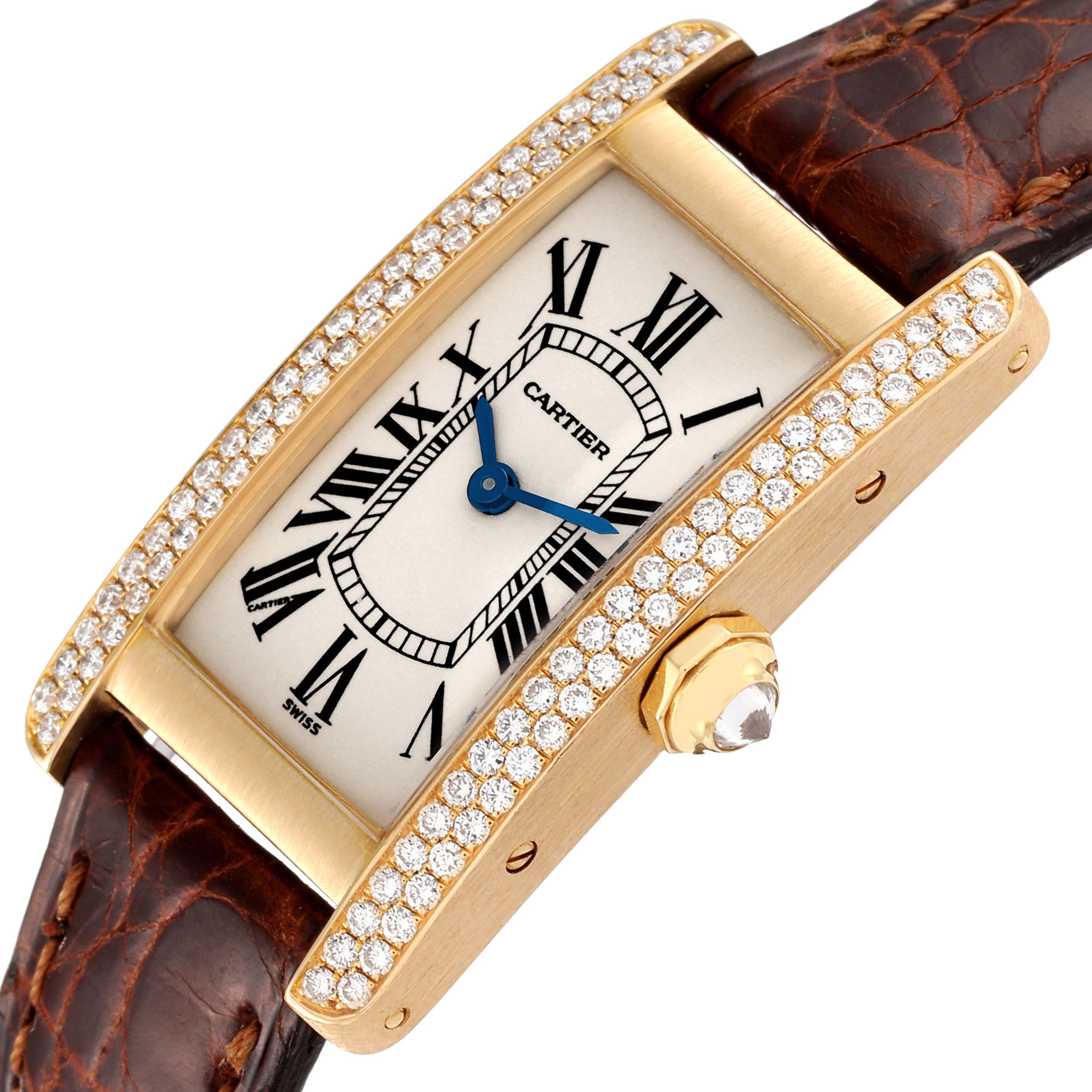 The Cartier Tank Americaine WB701251 Women
s Yellow Gold Silver Dial WB701251 Women
s Yellow Gold Silver Dial watch is shown at an oblique angle, highlighting its diamond bezel, Roman numerals, and leather strap.