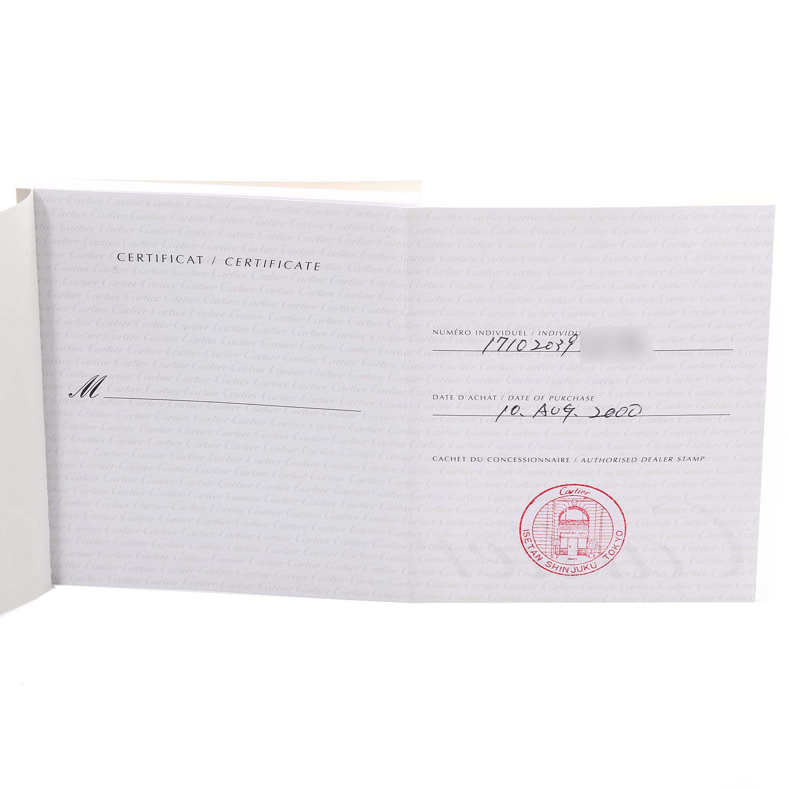 This image shows the certificate of purchase with dealer stamp for a Cartier Tank Américaine watch.