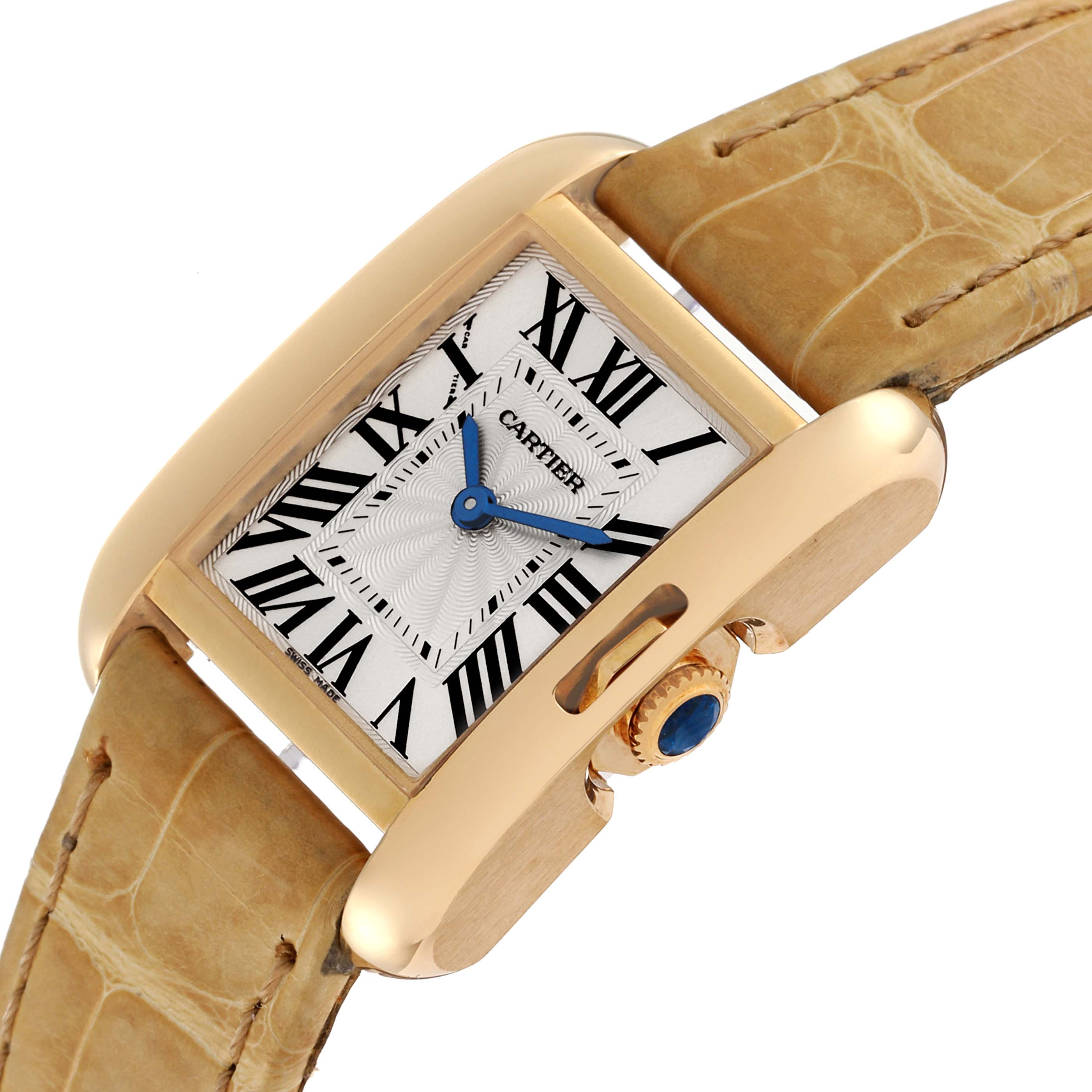 The Cartier Tank Anglaise W5310028 Women's Yellow Gold Silver Dial W5310028 Women's Yellow Gold Silver Dial watch is shown from a side angle, highlighting its rectangular face, Roman numeral dial, crown, and leather strap.