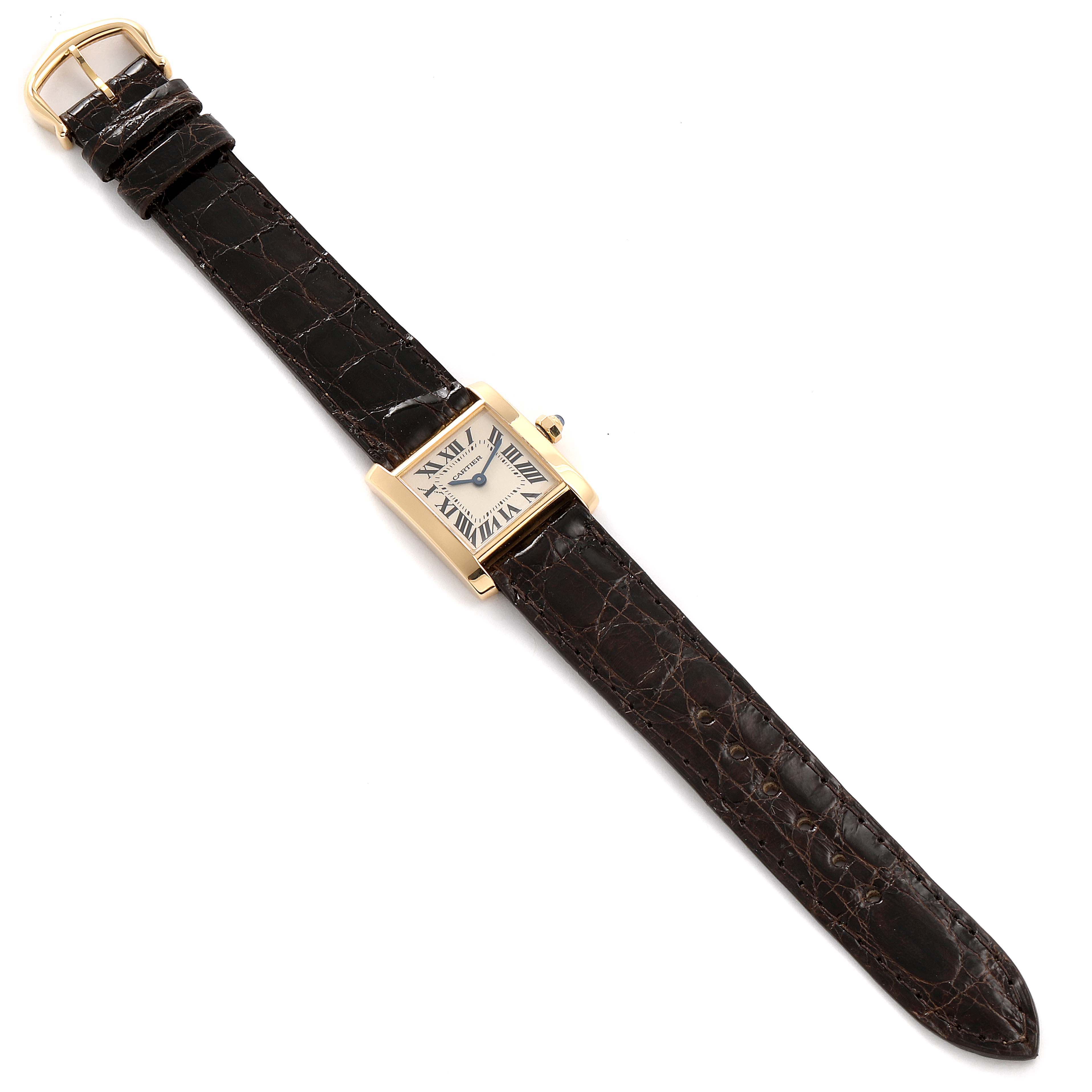 The image shows a Cartier Tank Francaise W5000256 Women's Yellow Gold Silver Dial W5000256 Women's Yellow Gold Silver Dial watch laid flat, displaying its brown leather strap and rectangular face.