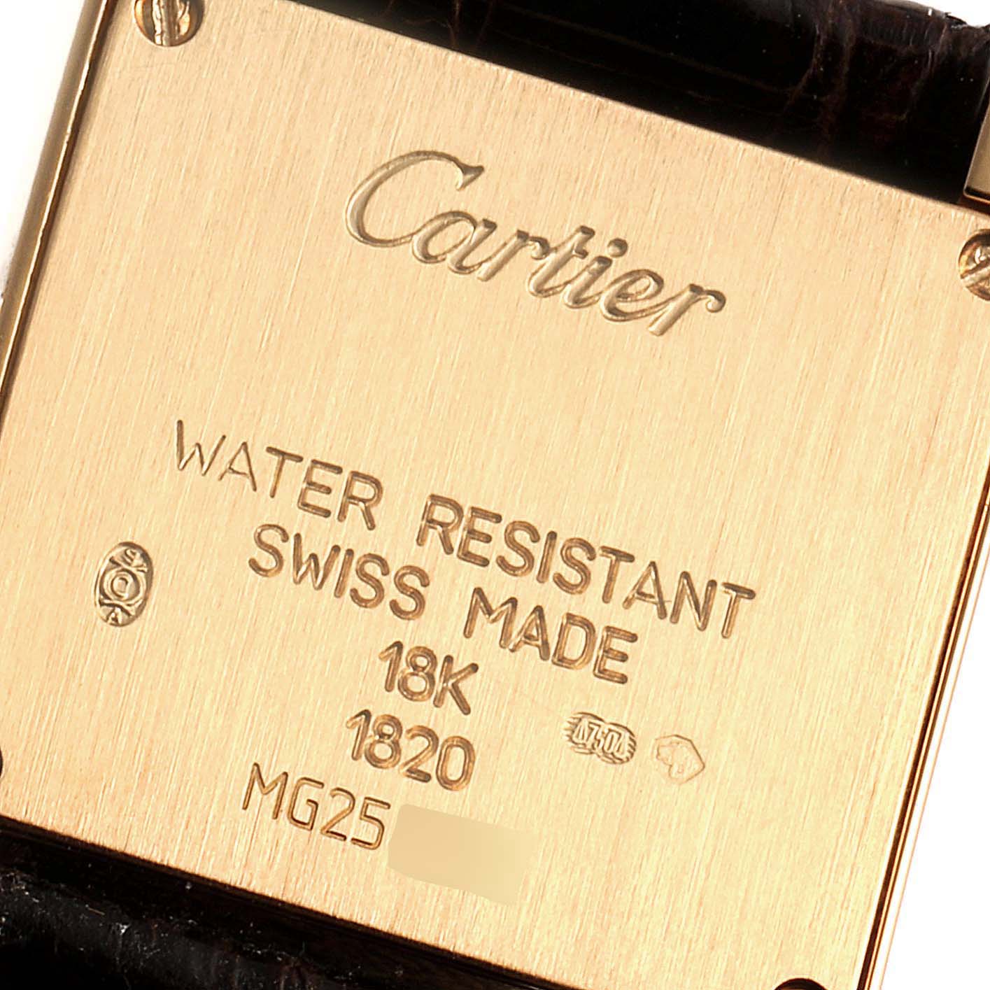 The image shows the engraved case back of a Tank Française model watch by Cartier, displaying its specifications and branding.