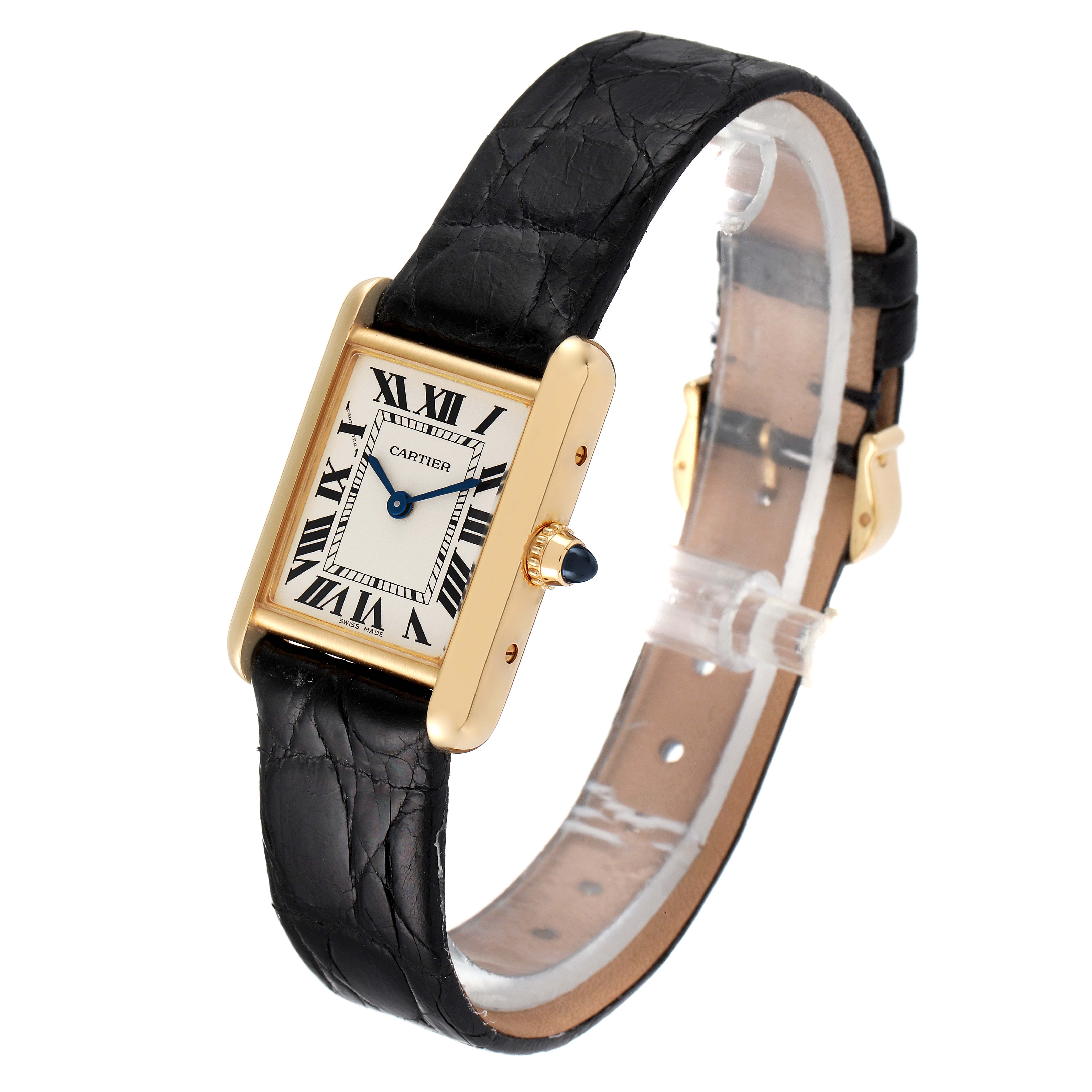 The image shows a Cartier Tank Louis W1529856 Women's Yellow Gold Silver Dial W1529856 Women's Yellow Gold Silver Dial model watch, captured at a slightly tilted angle, displaying its black leather strap and rectangular face.