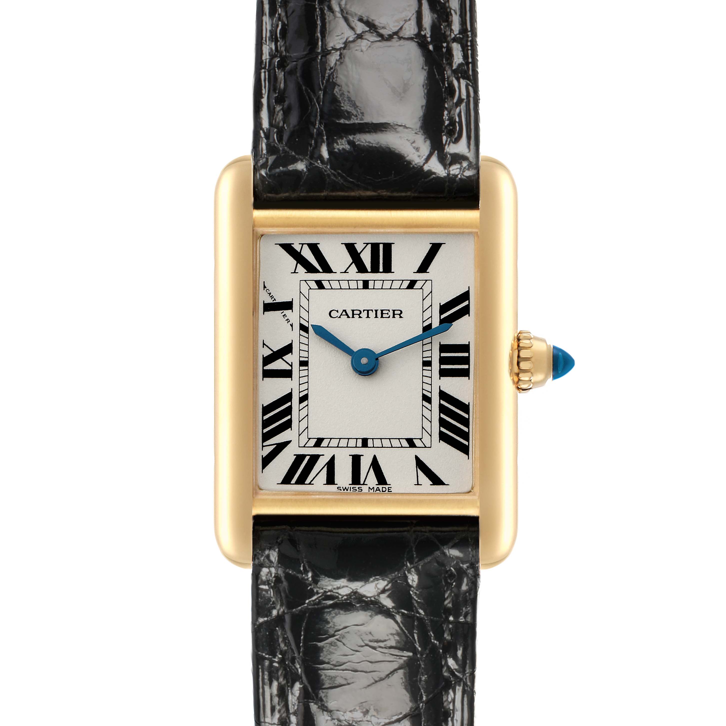 The Cartier Tank Louis W1529856 Women's Yellow Gold Silver Dial watch is shown from a top-down angle, displaying the face, Roman numerals, blue hands, and black strap.