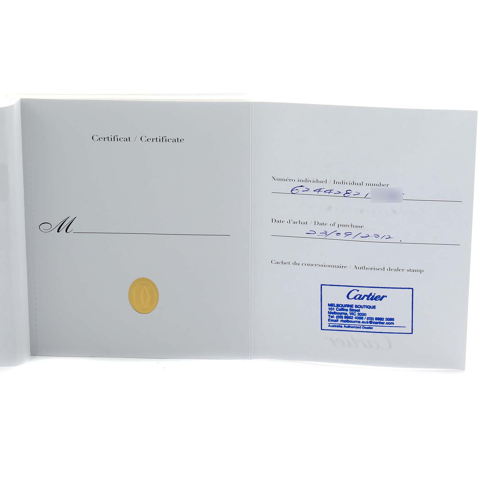 The image shows the authenticity certificate for the Cartier Tank Louis W1529856 Women's Yellow Gold Silver Dial watch, with a dealer stamp and purchase details.