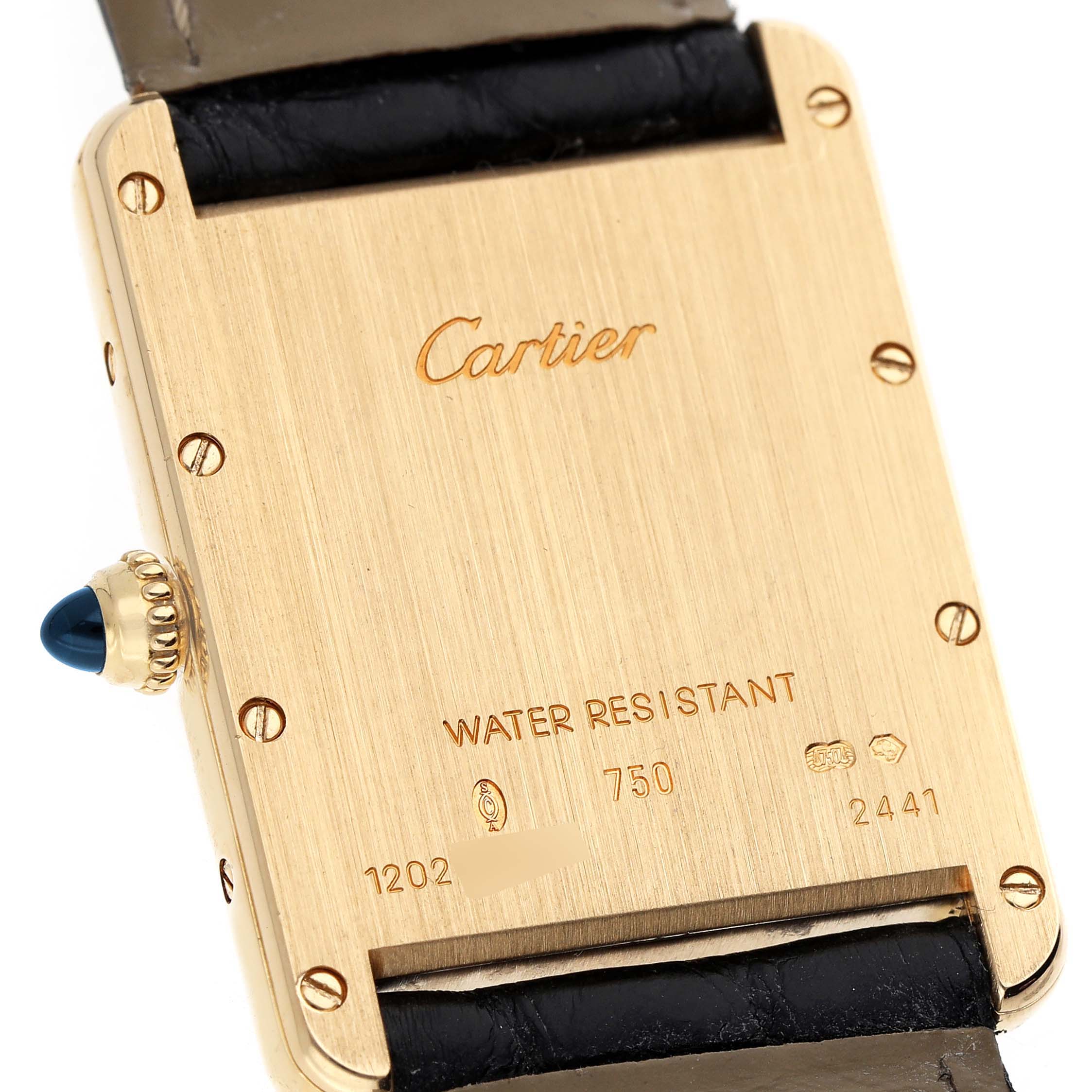 The image shows the back of a Cartier Tank Louis W1529756 Men's Yellow Gold Silver Dial watch, highlighting its engravings and a blue cabochon on the crown.