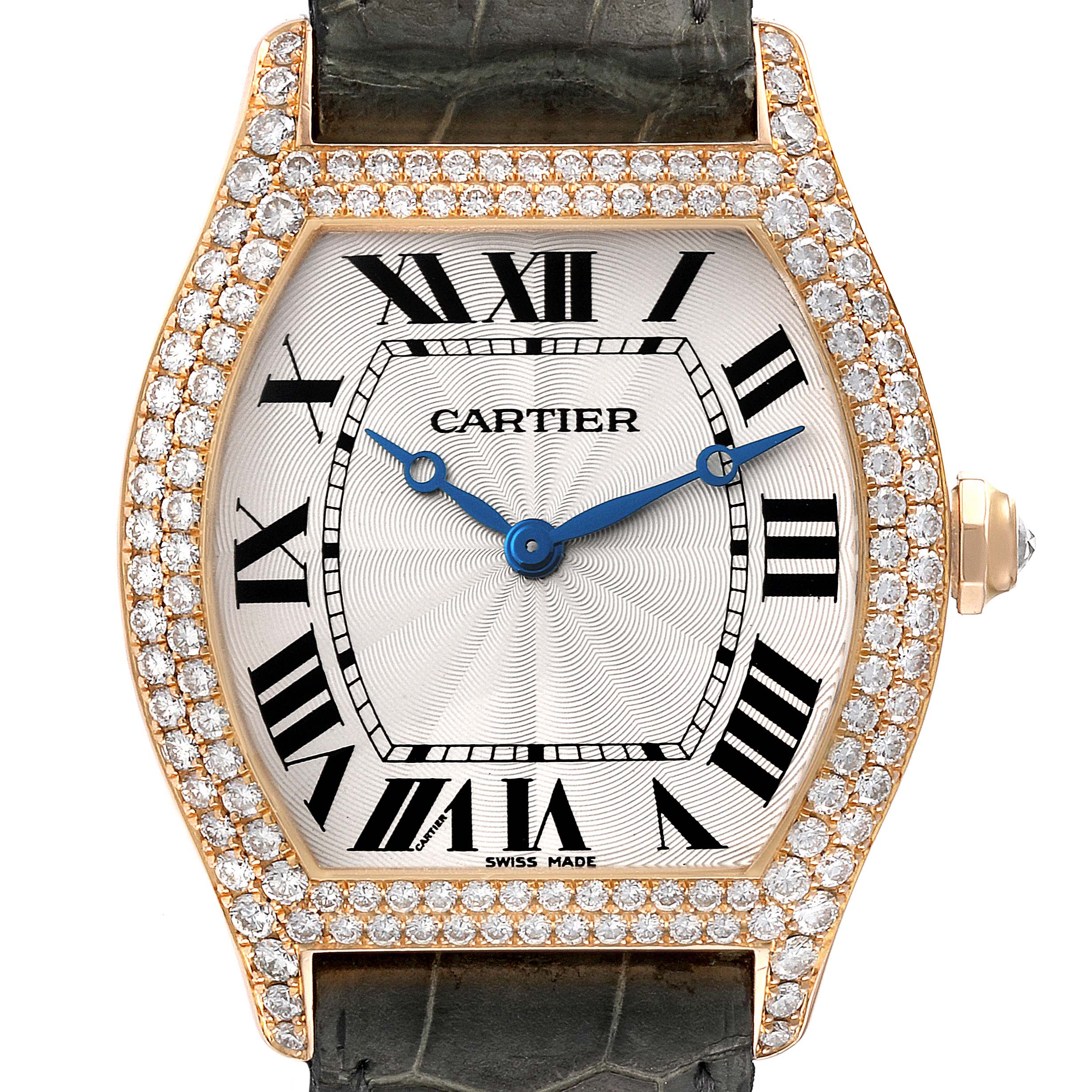 This image shows a close-up of the face and bezel of the Tortue model watch by Cartier, highlighting its diamond-studded case and Roman numeral dial.