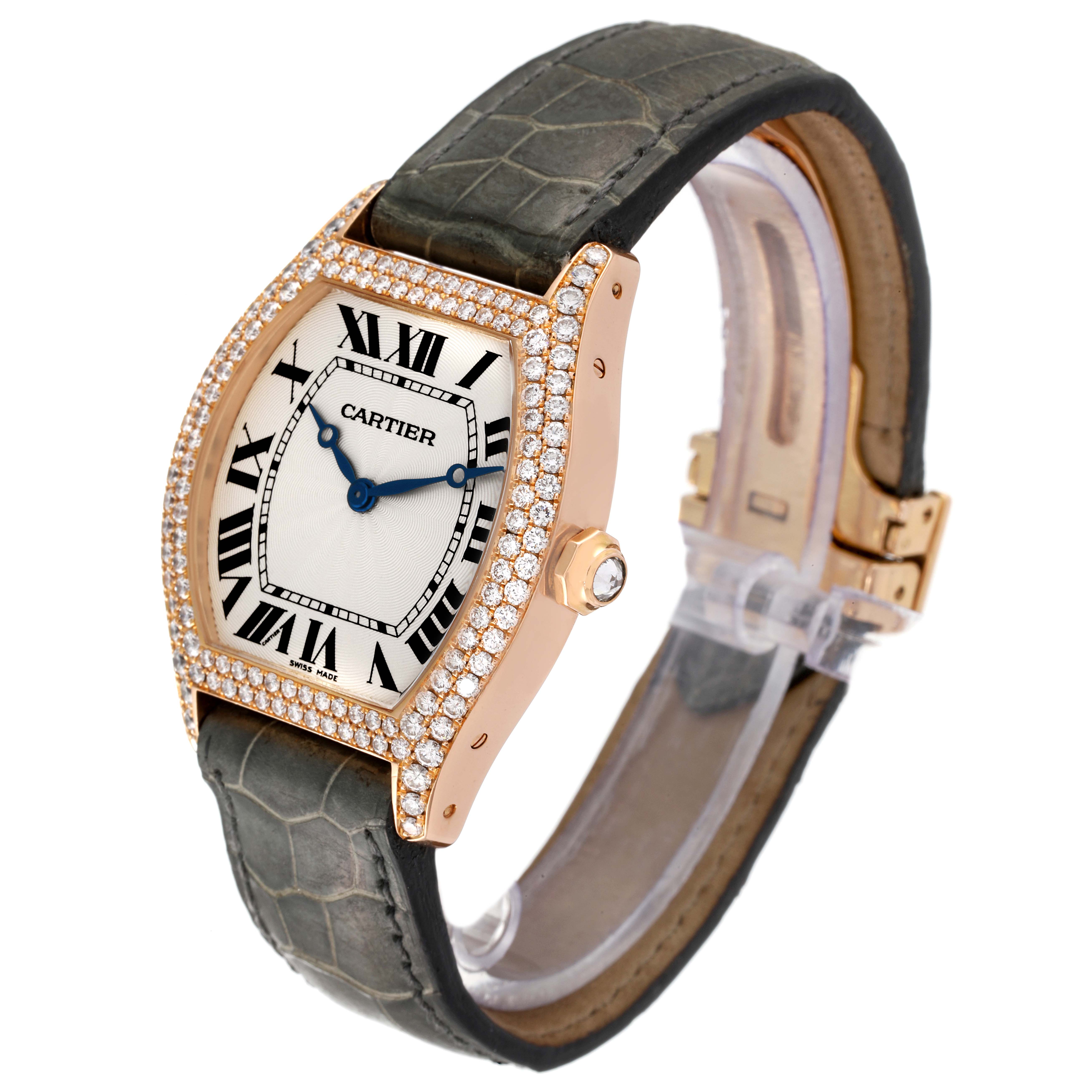 The Cartier Tortue WA503751 Women's Rose Gold Silver Dial WA503751 Women's Rose Gold Silver Dial watch is shown at a three-quarter angle, highlighting the diamond-encrusted bezel and leather strap.