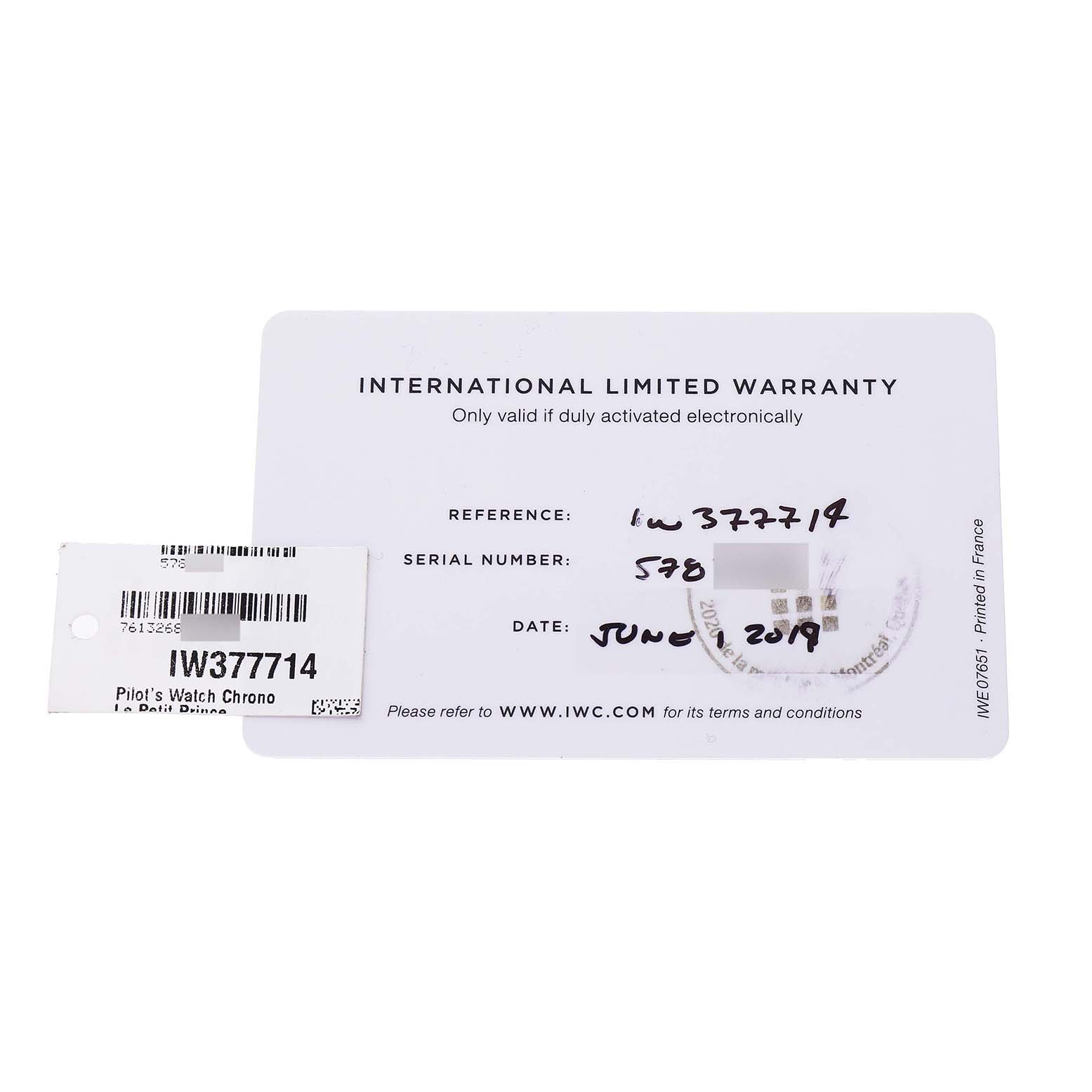 The image shows an IWC Pilot IW377714 Men's Stainless Steel Blue Dial model warranty card with reference and serial numbers, alongside a product tag.