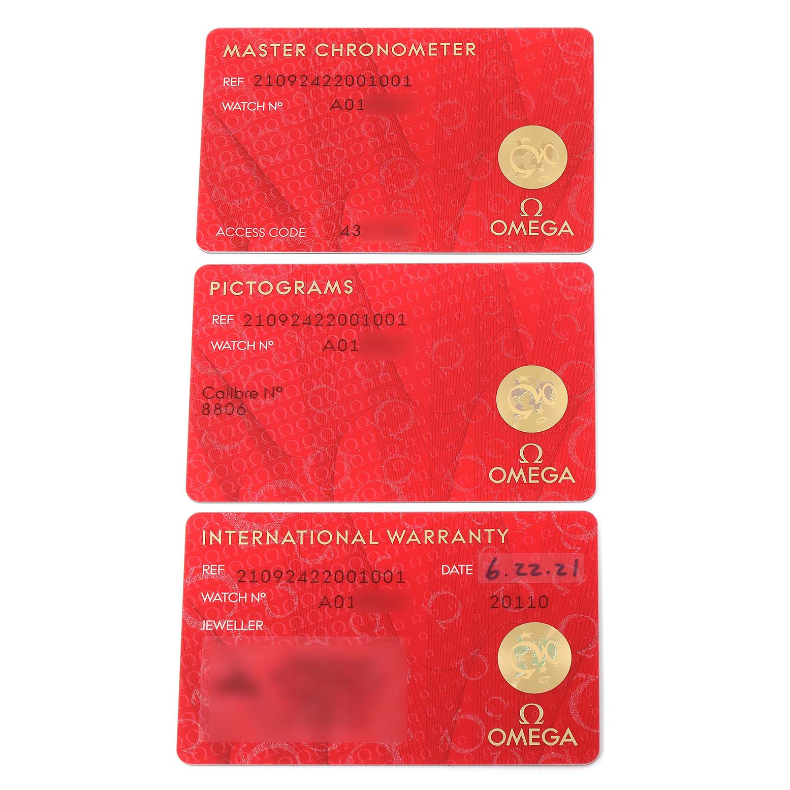 The image shows three red cards for the Omega Seamaster 210.92.42.20.01.001 Men's Titanium Brown Dial 210.92.42.20.01.001 Men's Titanium Brown Dial model watch: a Master Chronometer card, a Pictograms card, and an International Warranty card.