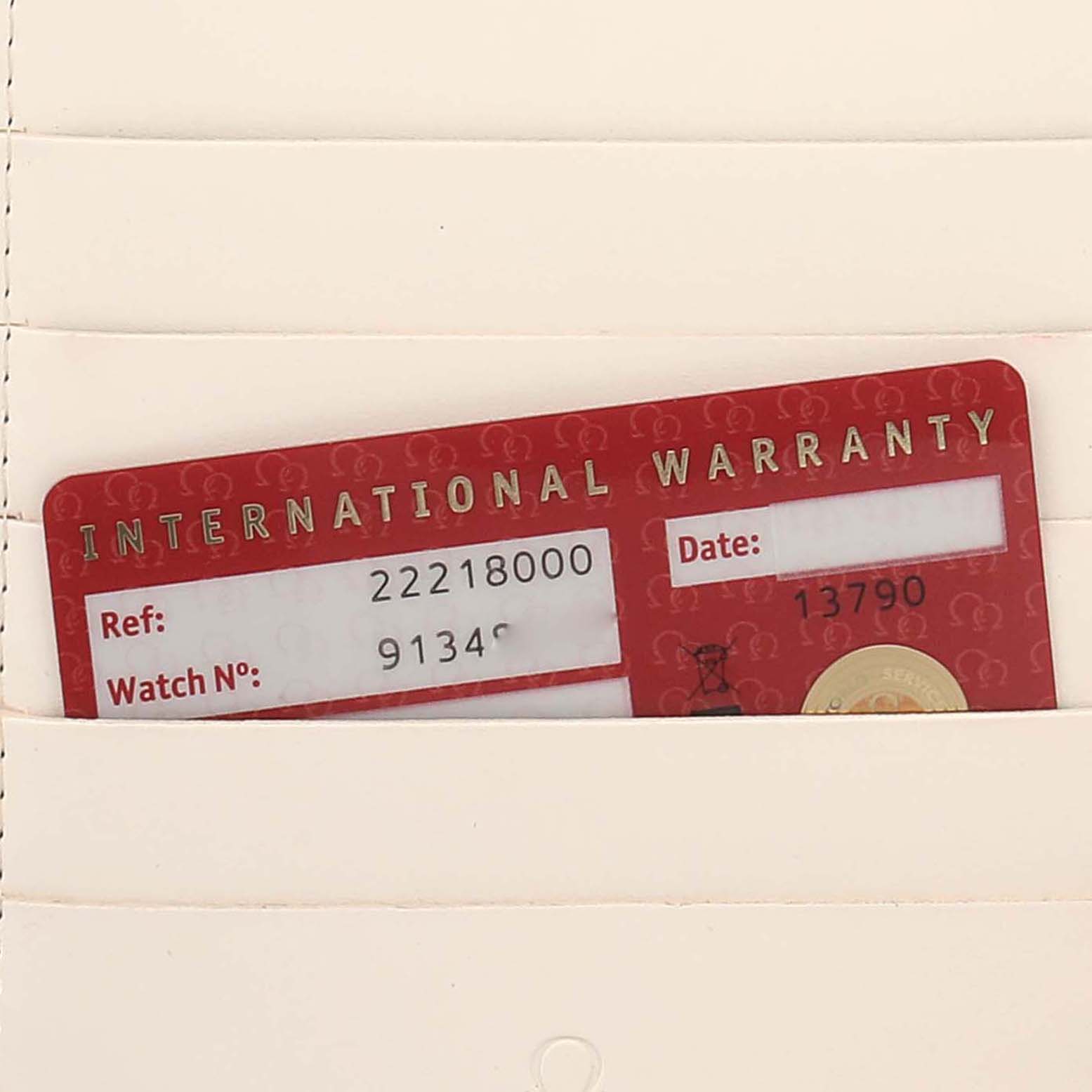 The image shows the international warranty card of an Omega Seamaster 2221.80.00 Men's Stainless Steel Blue Dial 2221.80.00 Men's Stainless Steel Blue Dial, partially in a holder.