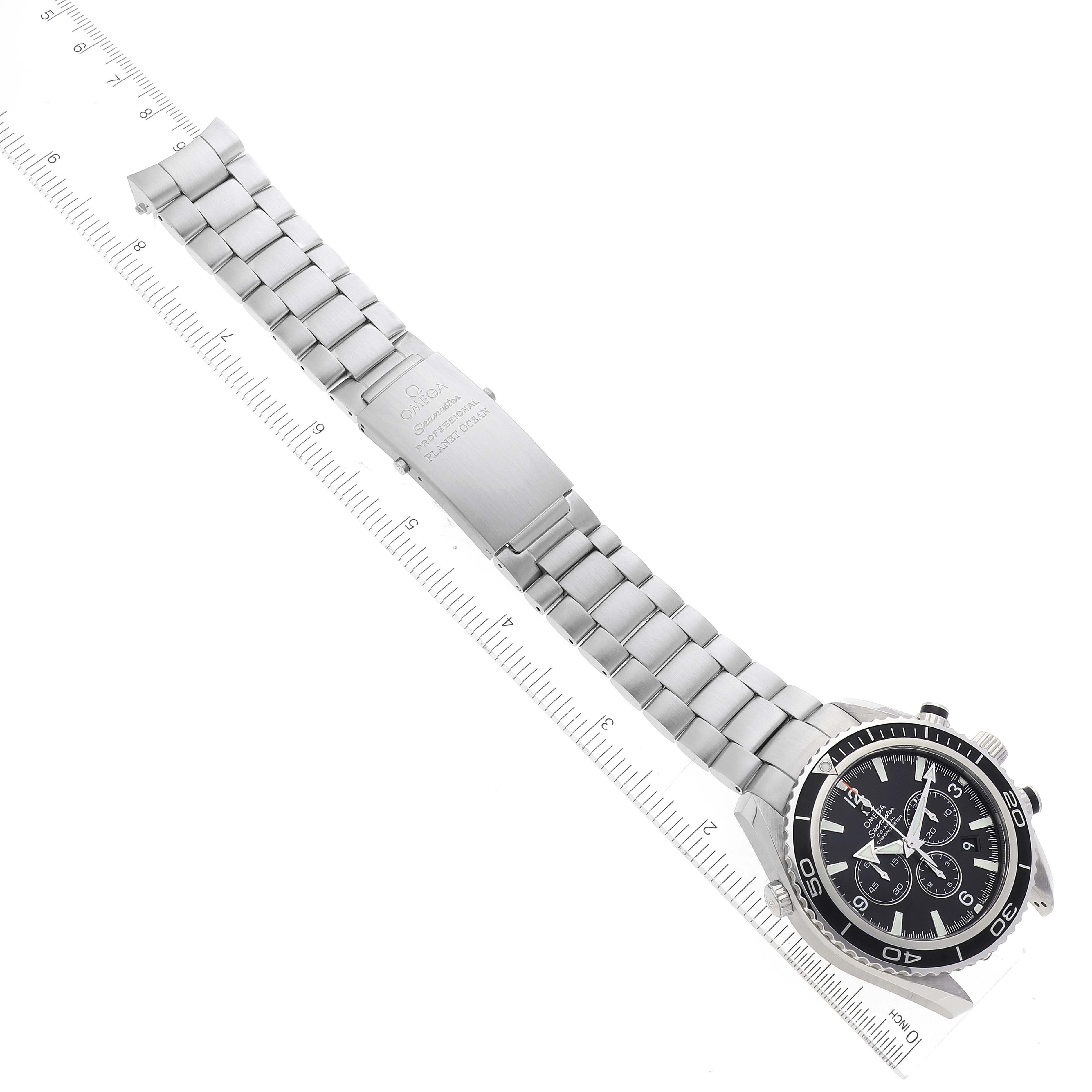 The image shows an Omega Planet Ocean 2210.50.00 Men
s Stainless Steel Black Dial 2210.50.00 Men
s Stainless Steel Black Dial watch at an angle, highlighting the entire metal bracelet and the dial.