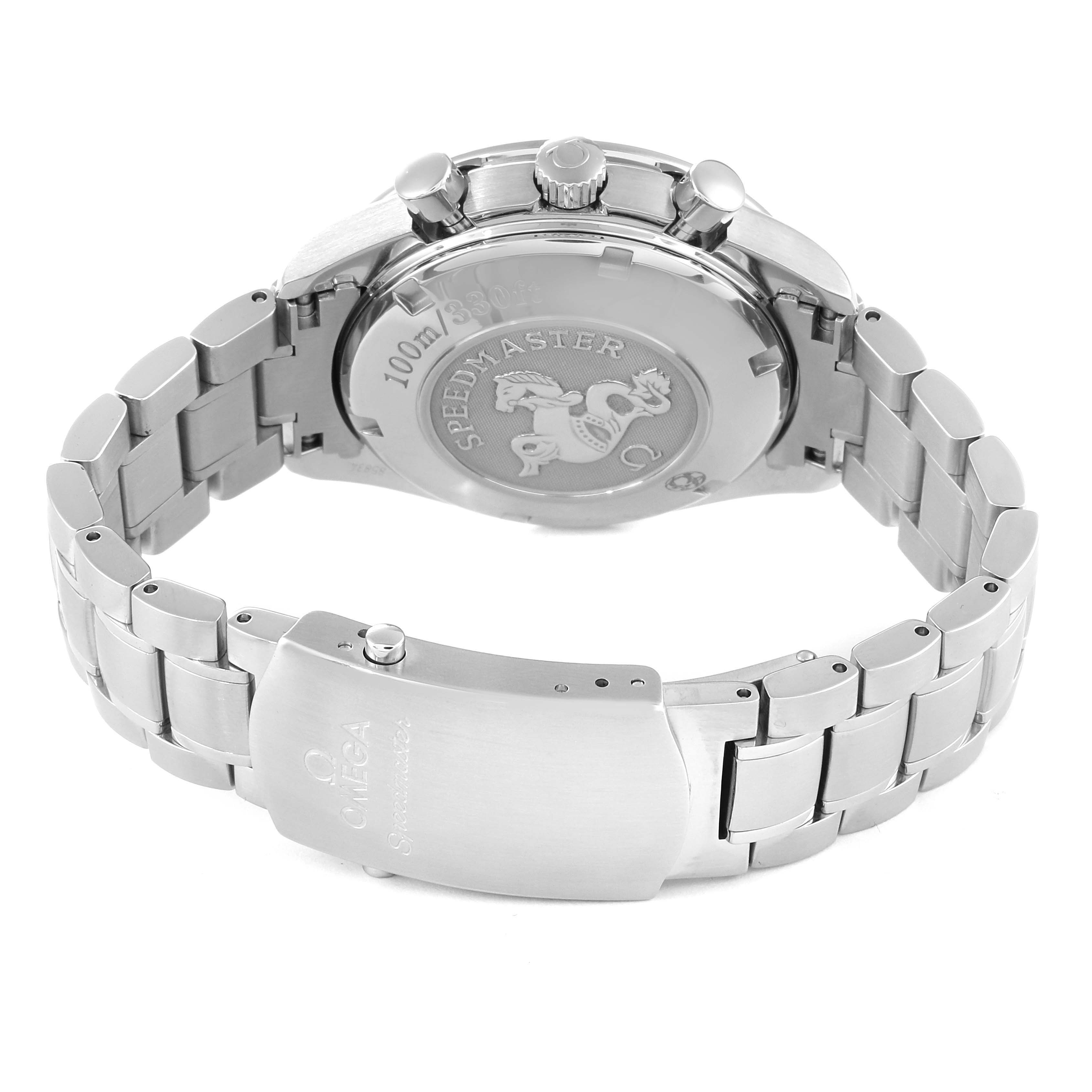 The image shows the back view of the Omega Speedmaster 3211.31.00 Men's Steel and Gold (two tone) Silver Dial 3211.31.00 Men's Steel and Gold (two tone) Silver Dial watch, highlighting the case back with an emblem and the metal bracelet with clasp.