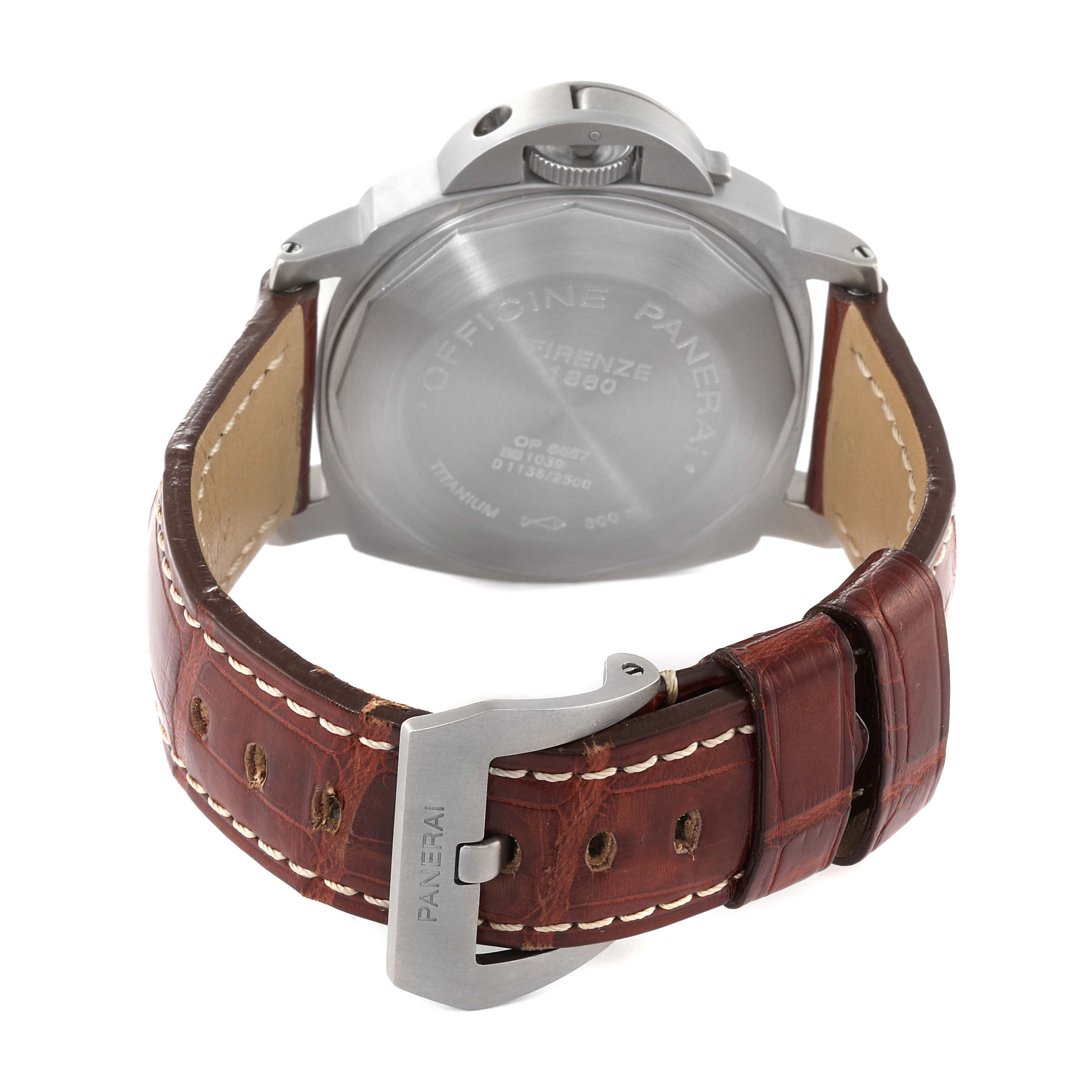 The image shows a rear angle of the Panerai Luminor PAM00093 Men's Titanium Blue Dial PAM00093 Men's Titanium Blue Dial watch, highlighting its back casing and brown leather strap with a branded buckle.