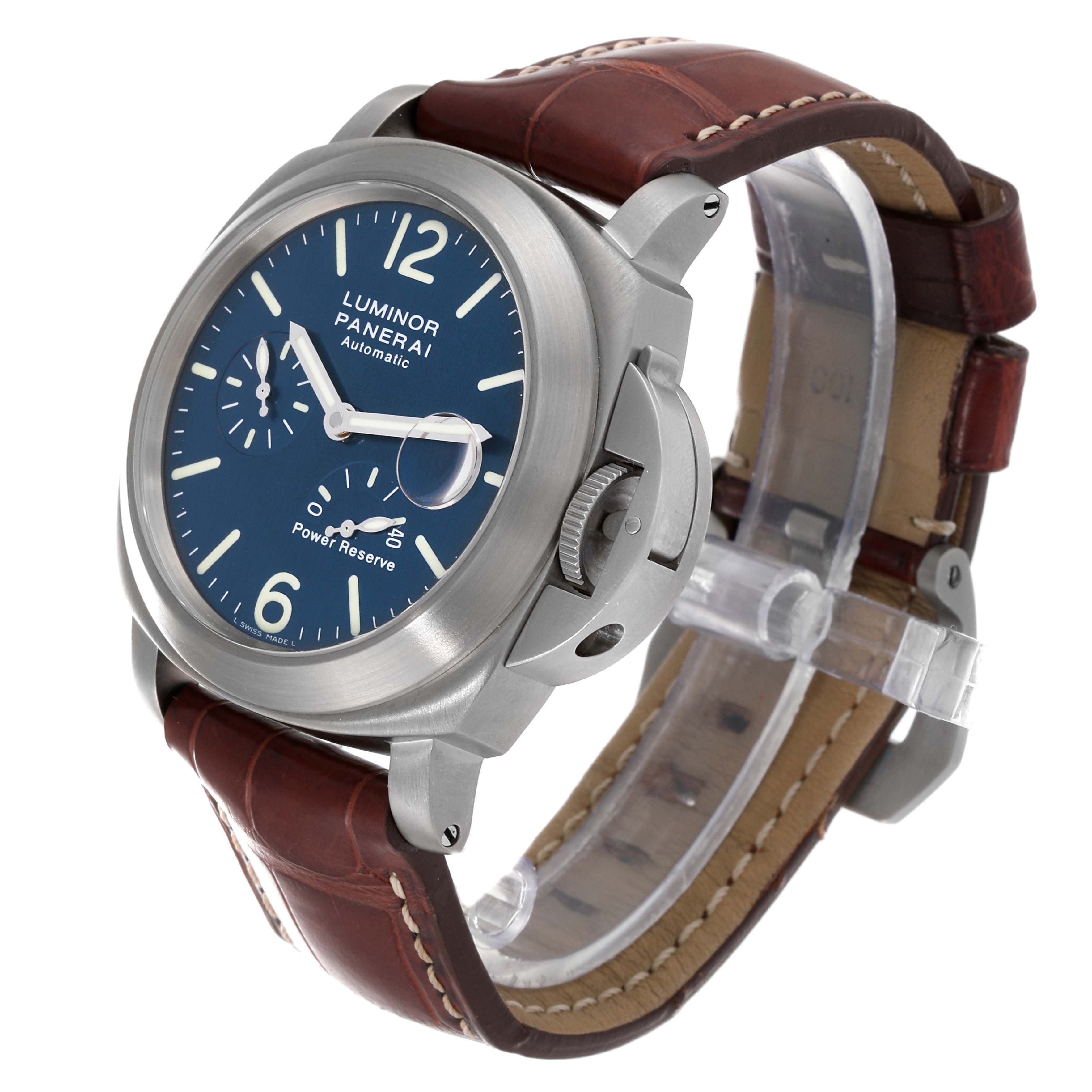 The image shows a side angle of the Panerai Luminor PAM00093 Men's Titanium Blue Dial PAM00093 Men's Titanium Blue Dial watch, highlighting its blue dial, power reserve indicator, and brown leather strap.